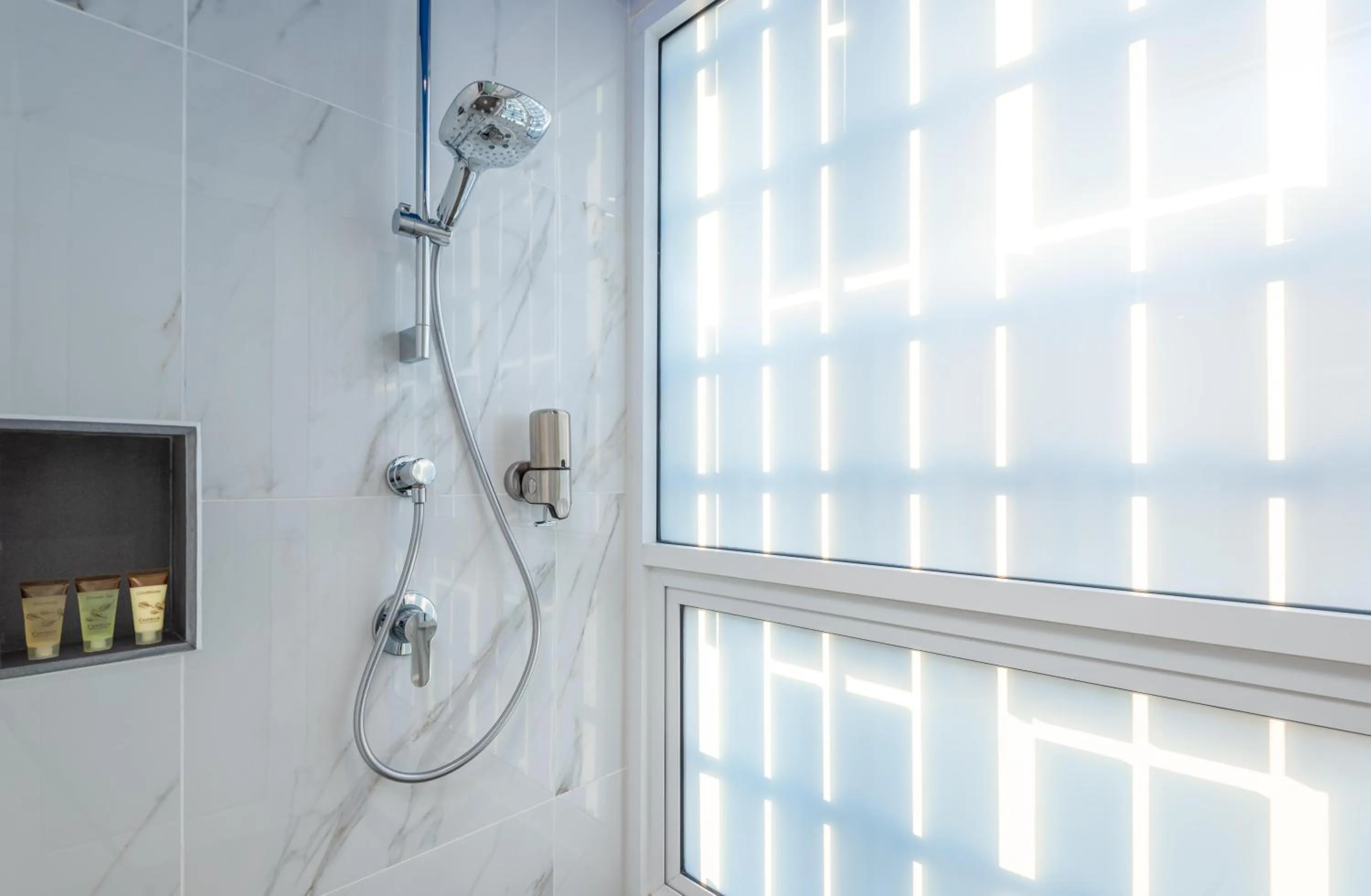 Shower in Maitria Hotel Rama 9 Bangkok - A Chatrium Collection