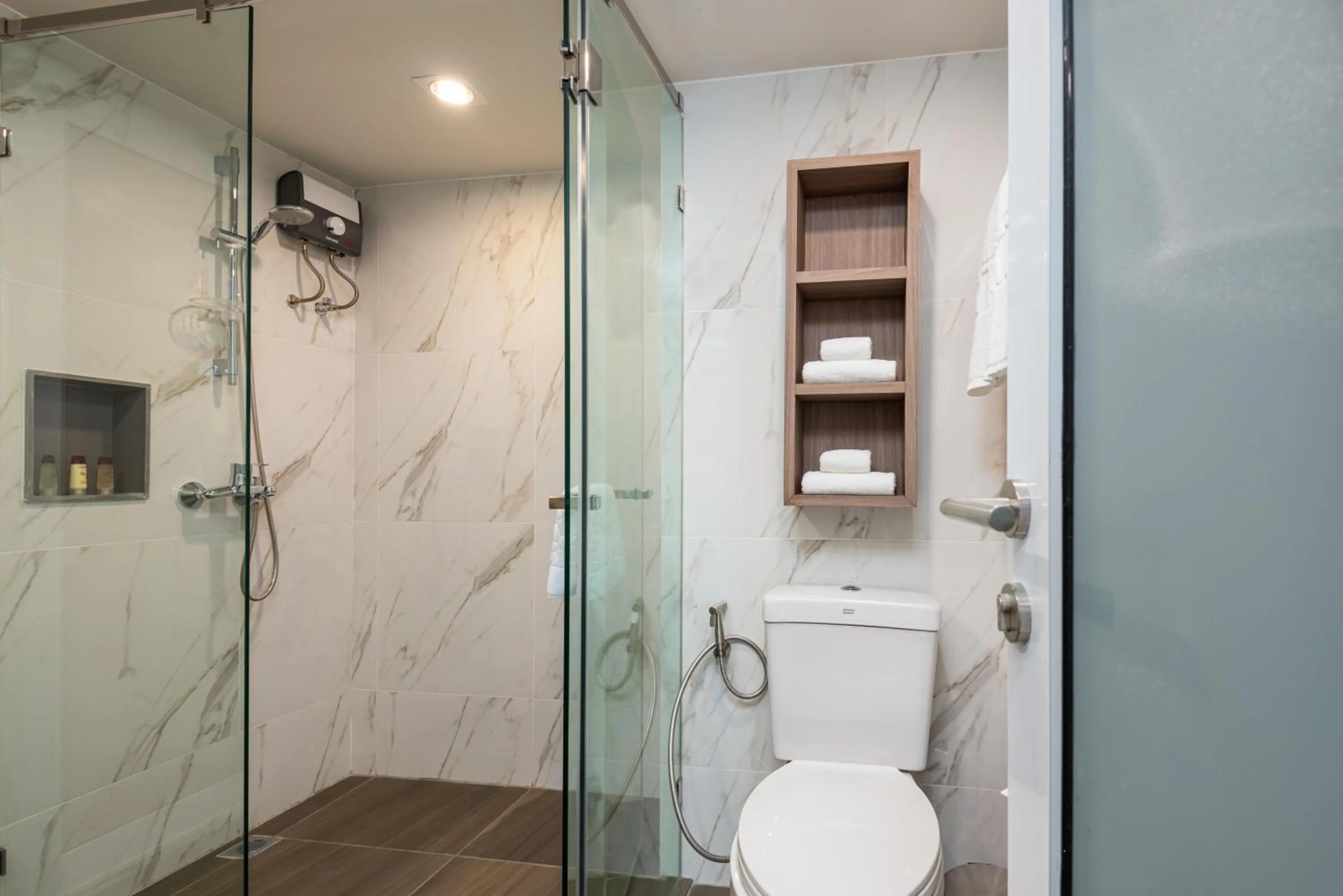 Shower in Maitria Hotel Rama 9 Bangkok - A Chatrium Collection