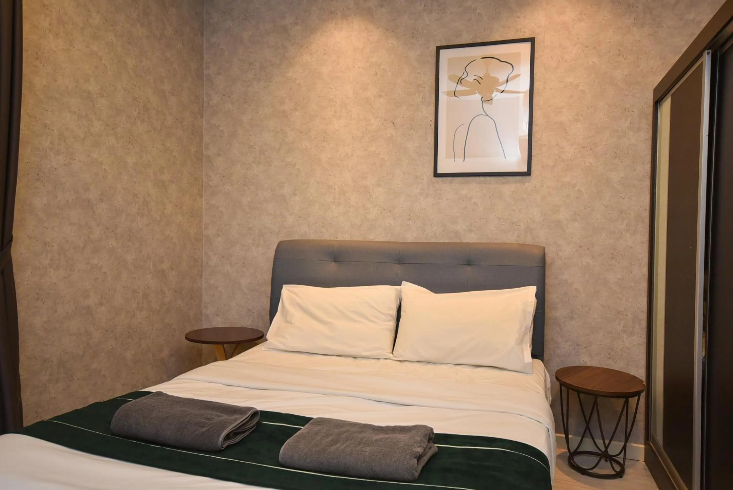 Bedroom, Bed in Suasana Residence by Nest Home