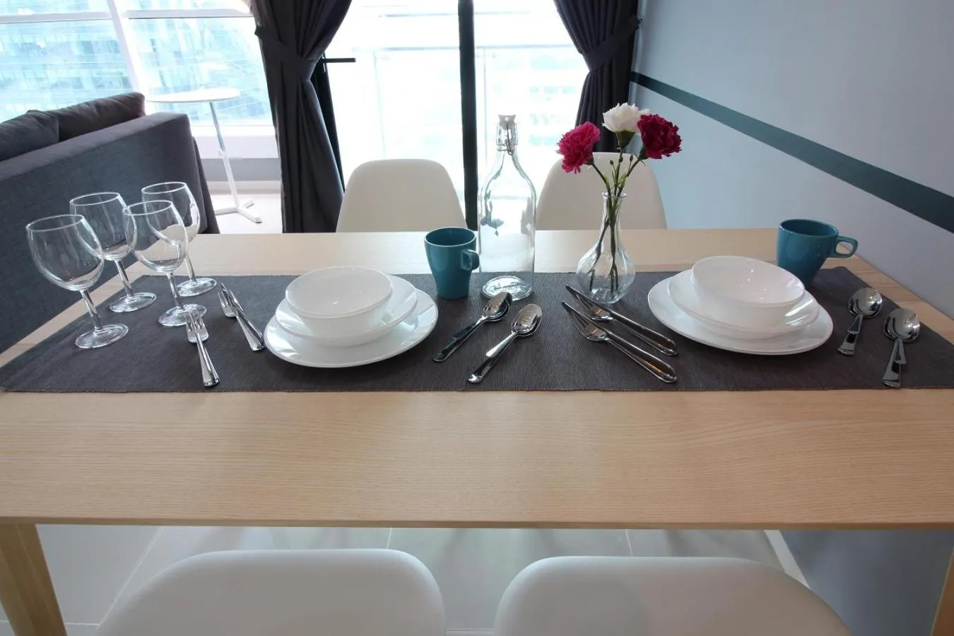 Dining area in Suasana Residence by Nest Home