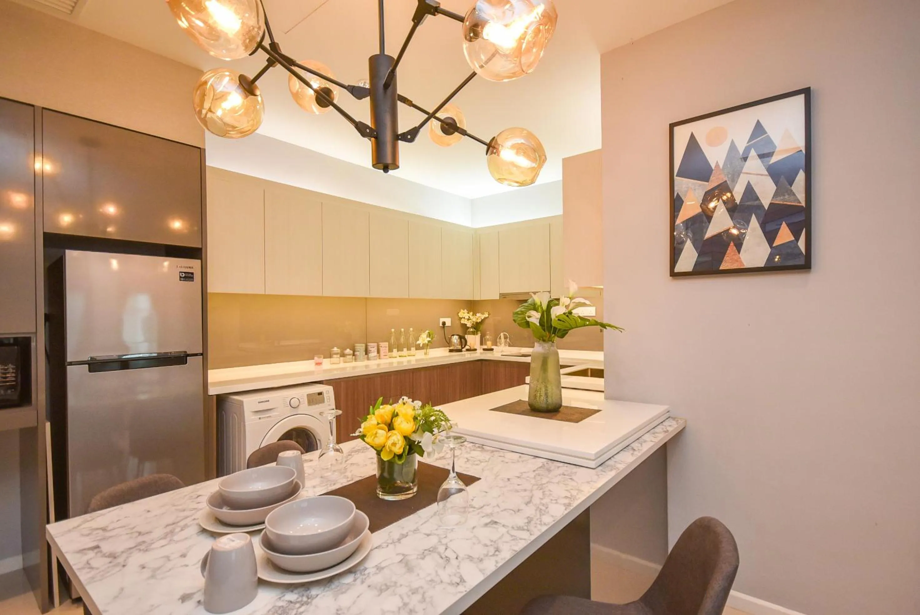 Dining area in Suasana Residence by Nest Home