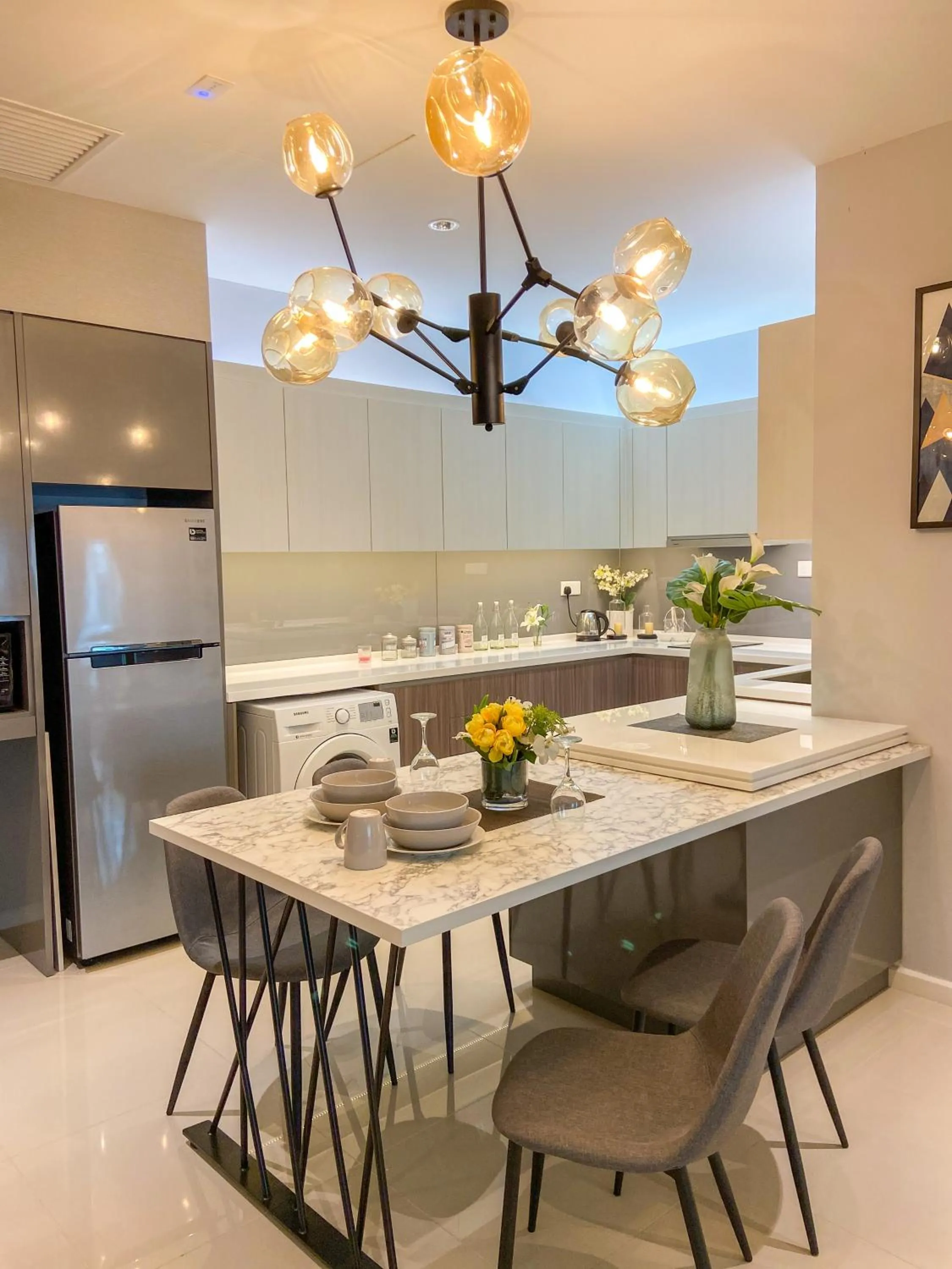 Dining area in Suasana Residence by Nest Home