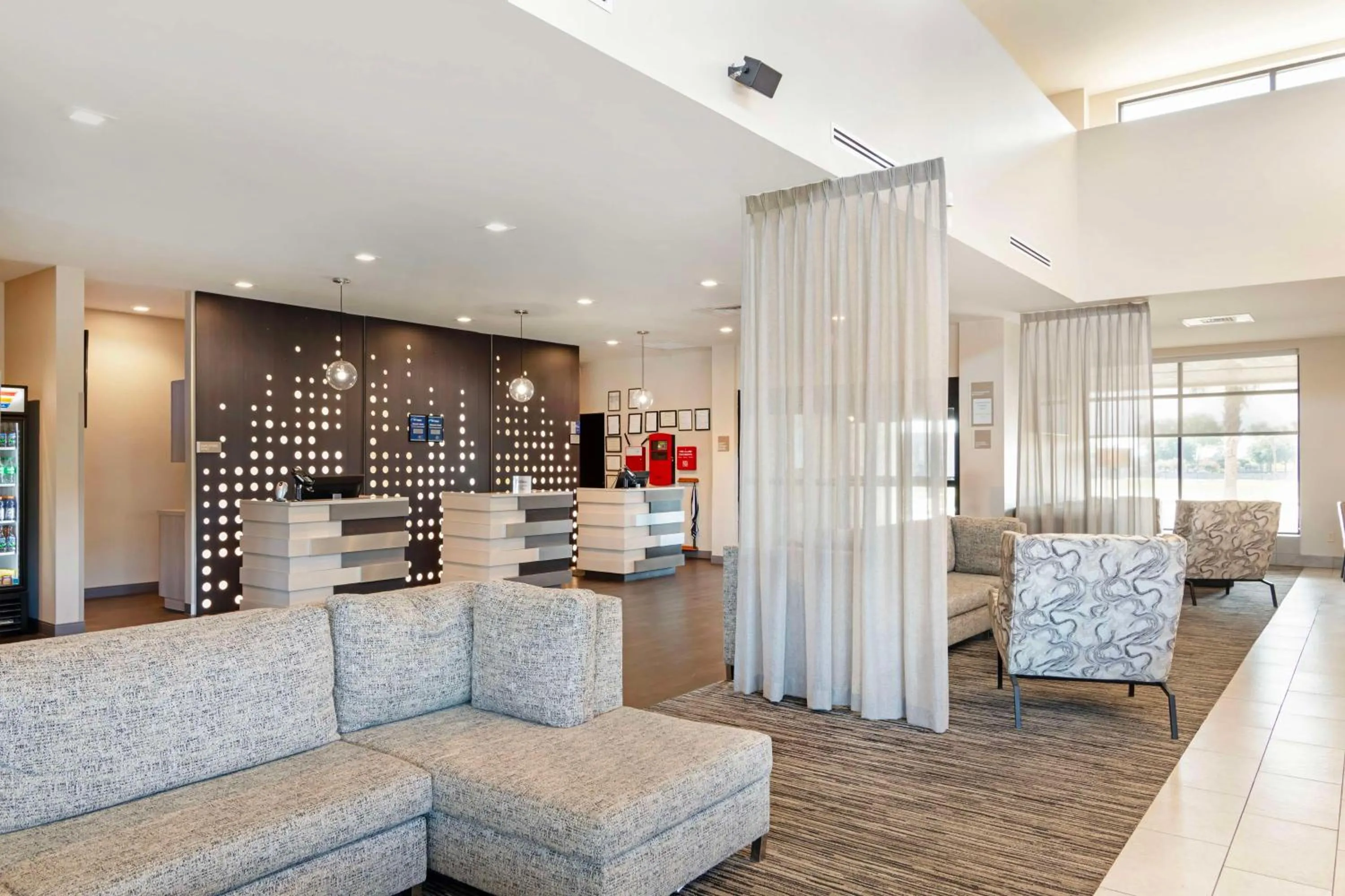Lobby or reception in Best Western Plus Executive Residency Rigby's Water World Hotel