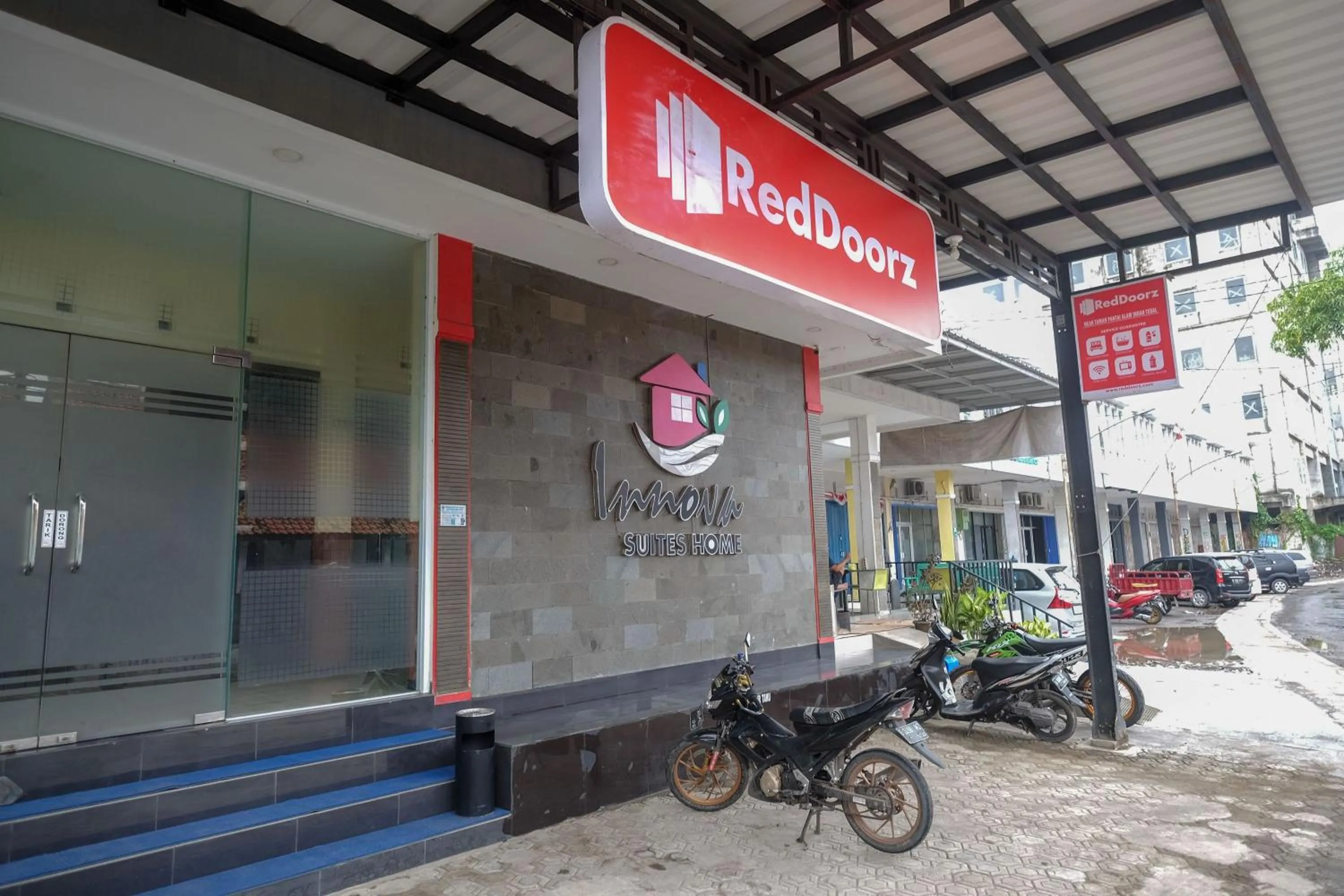 Property logo or sign in RedDoorz near Taman Pantai Alam Indah Tegal