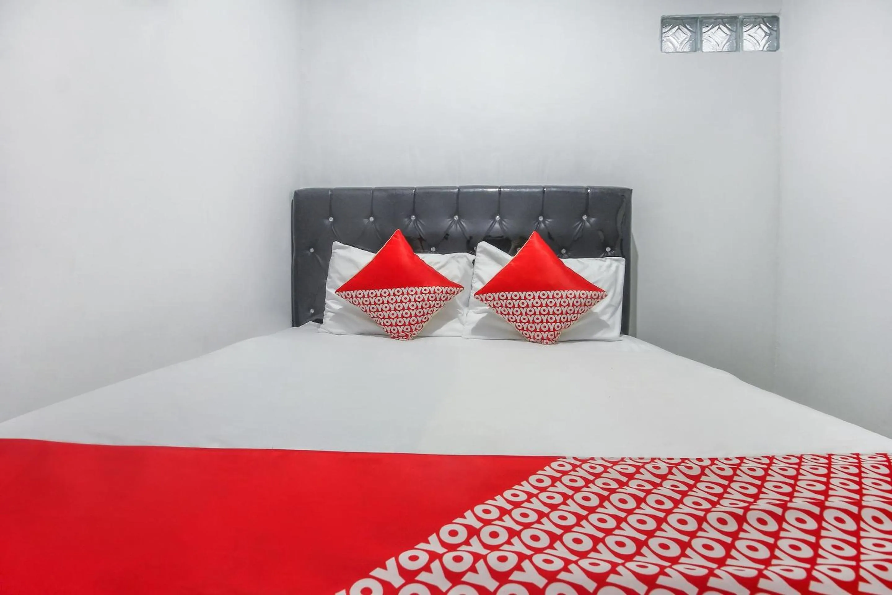 Bedroom in OYO 3399 Gea Guest House