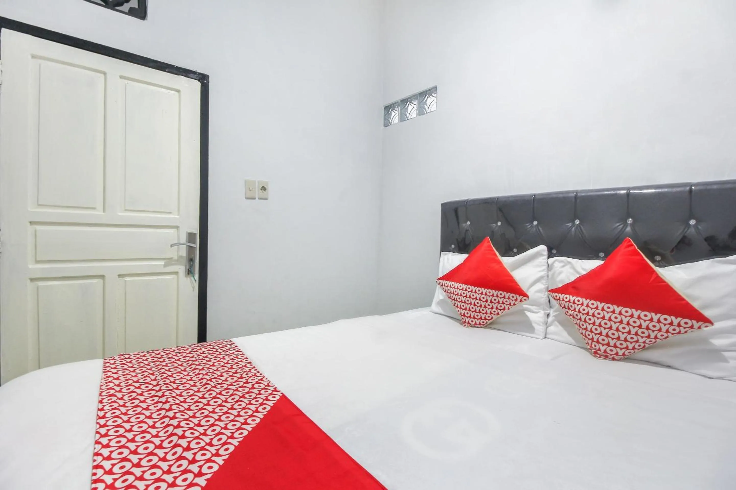 Bedroom in OYO 3399 Gea Guest House