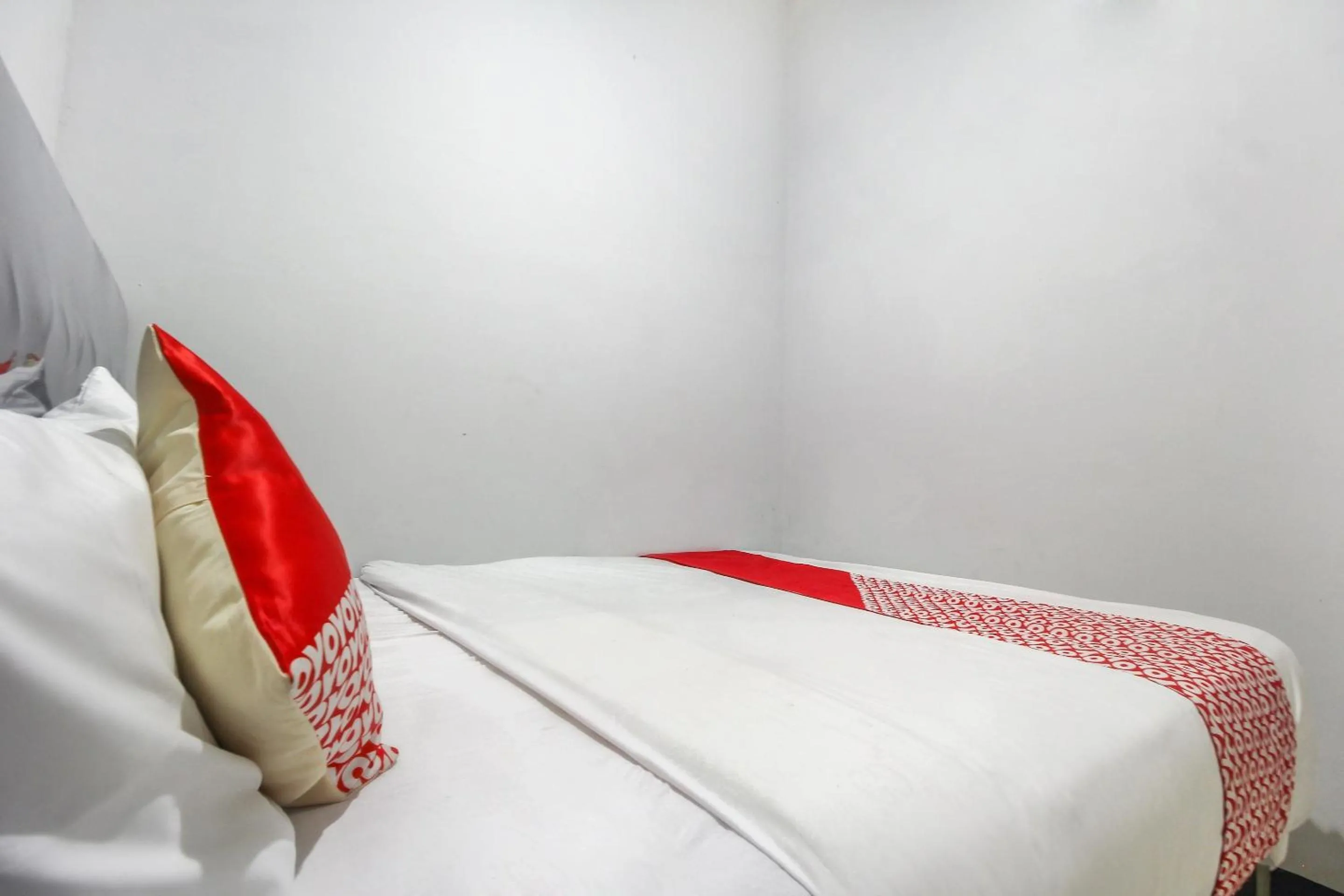 Bedroom in OYO 3399 Gea Guest House