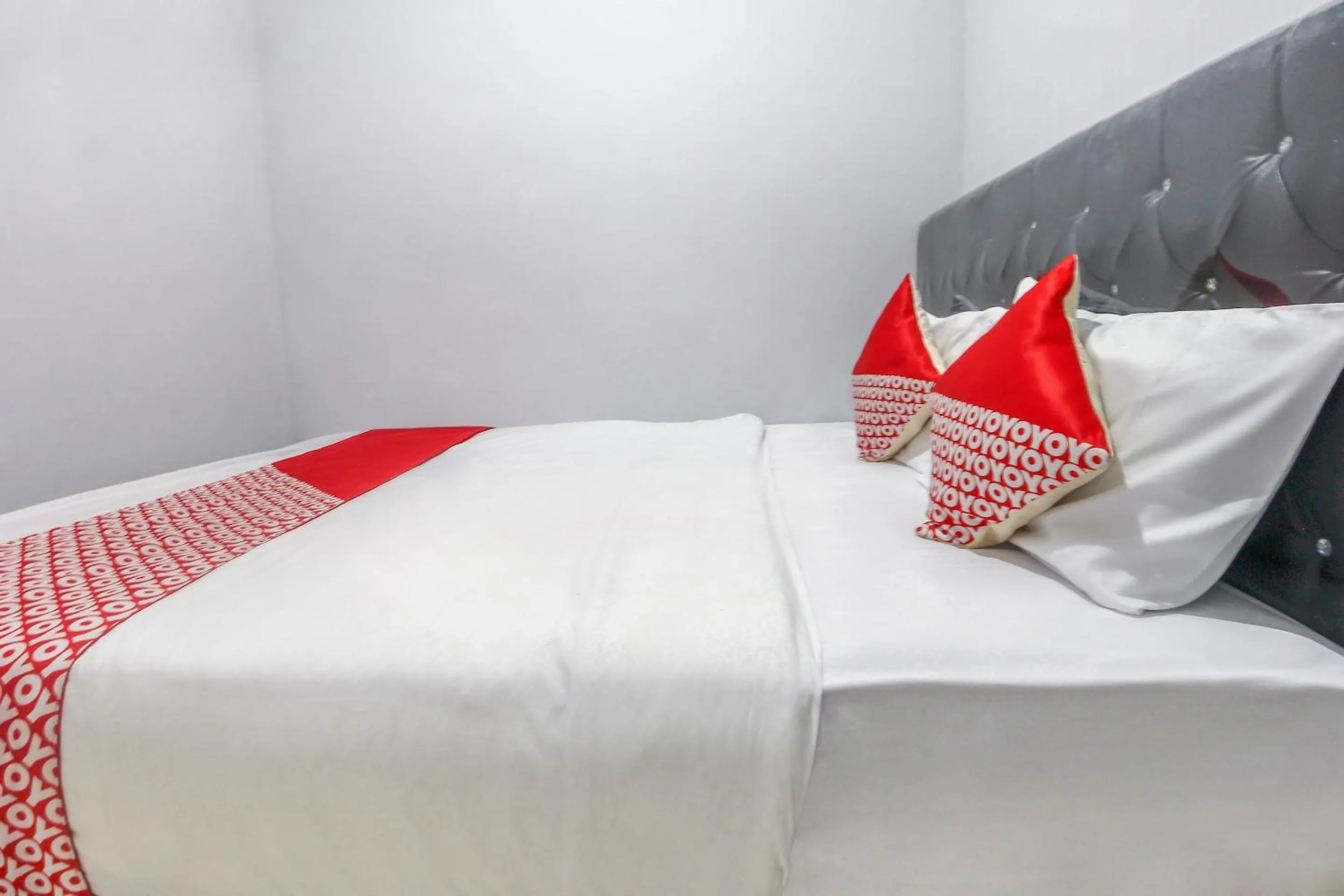 Bedroom in OYO 3399 Gea Guest House