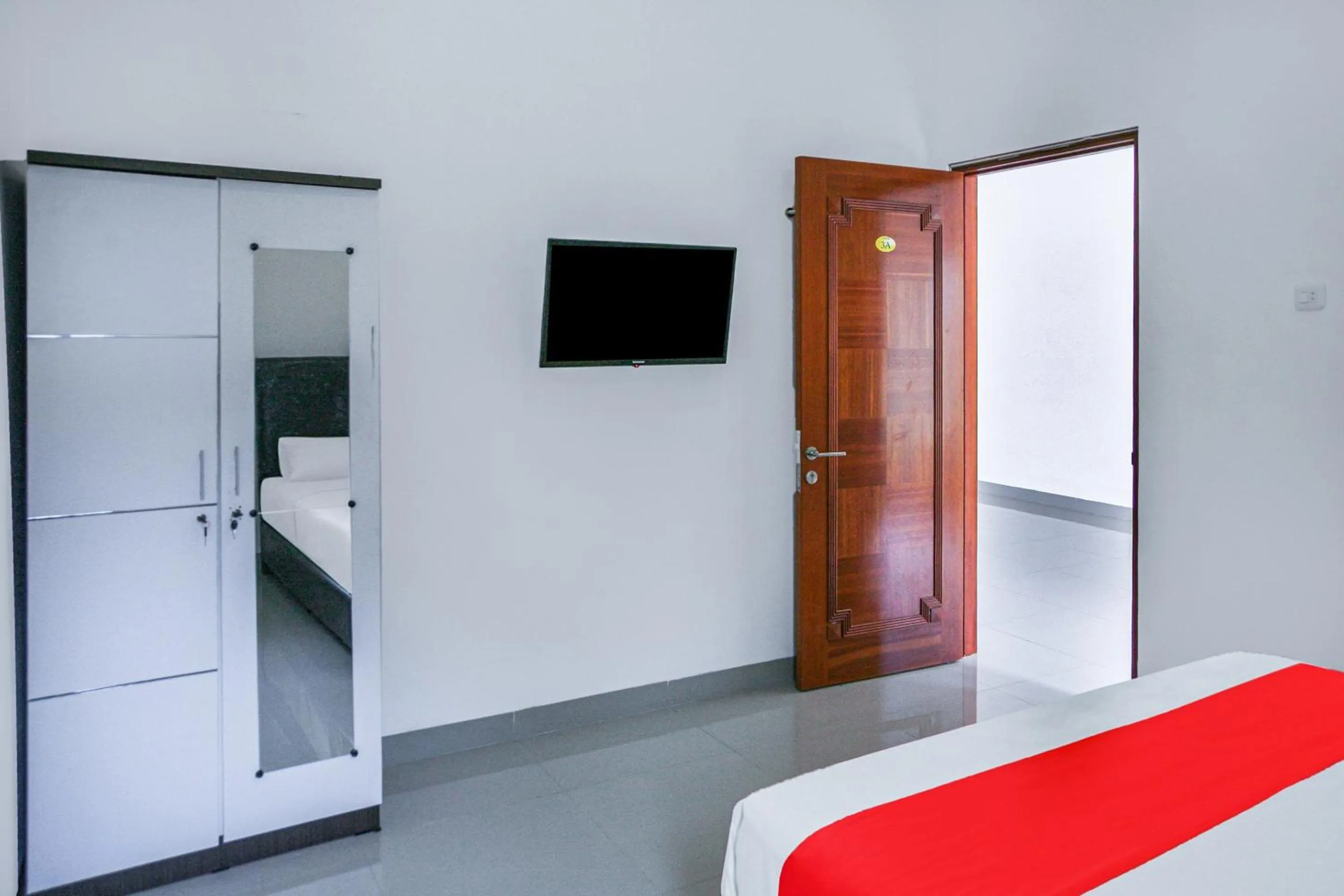 Bedroom in Hotel O Pasir Padi Inn Syariah