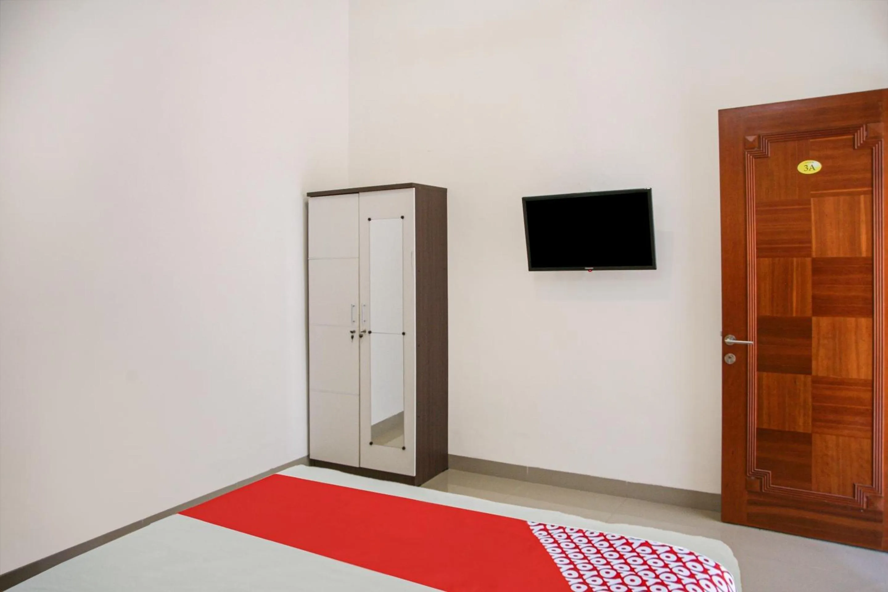 Bedroom in Hotel O Pasir Padi Inn Syariah