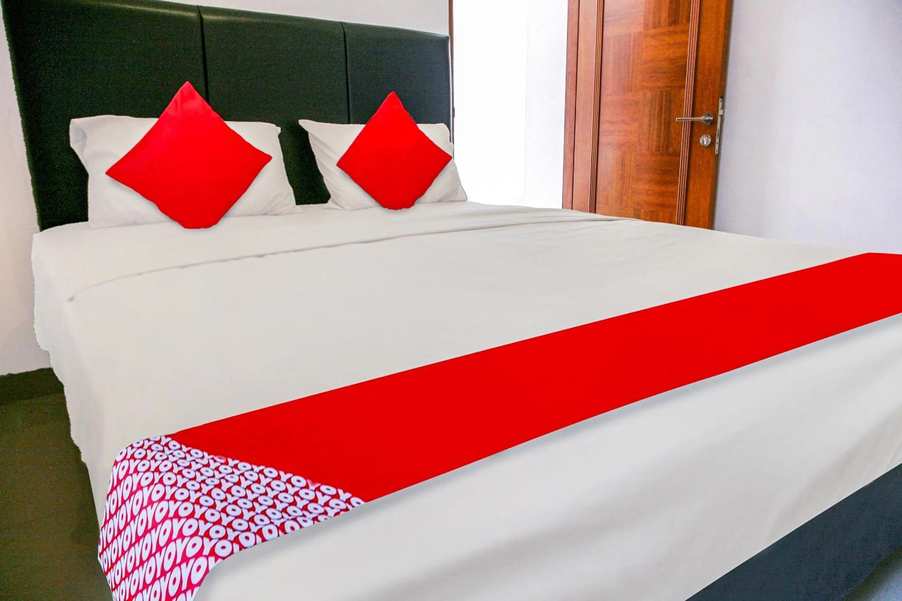 Bedroom in Hotel O Pasir Padi Inn Syariah