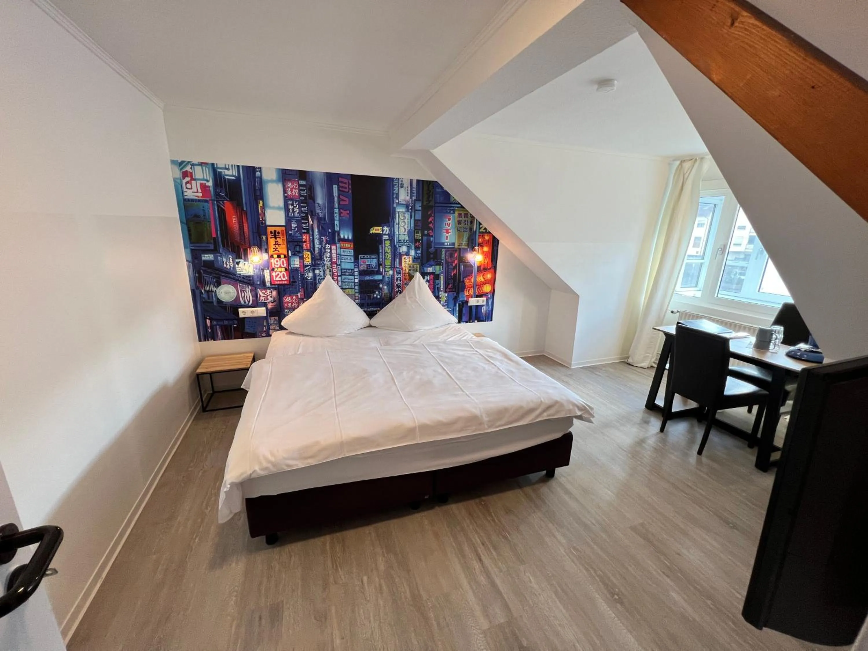 Photo of the whole room, Bed in Hotel Bitzer Backnang