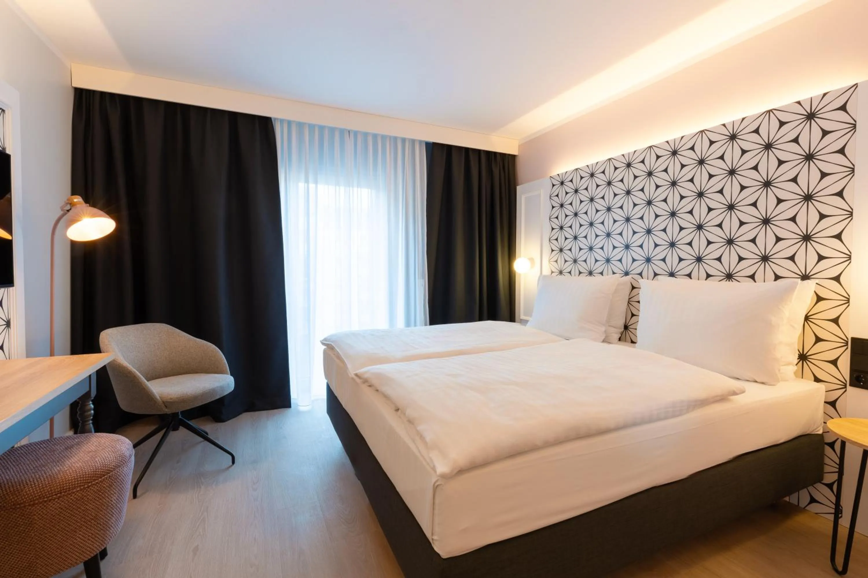 Photo of the whole room, Bed in Garner Hotel Mannheim City by IHG