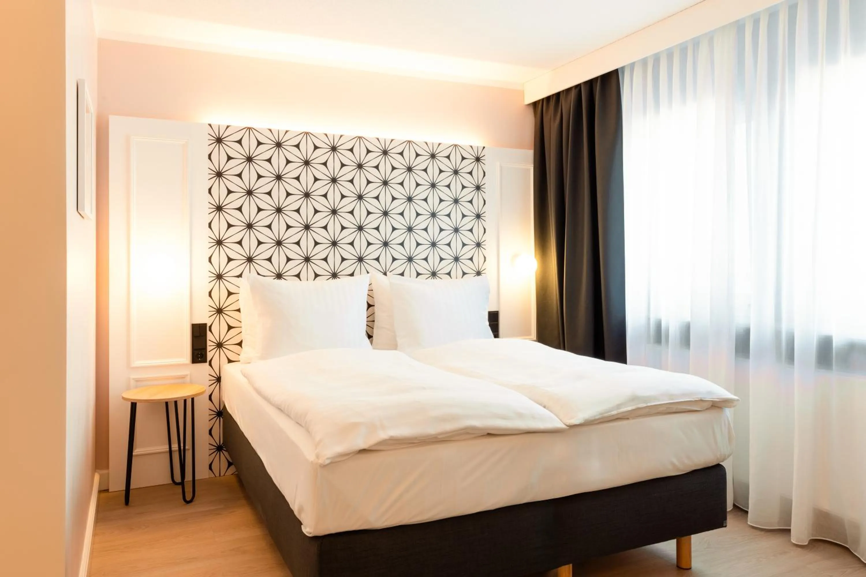 Photo of the whole room, Bed in Garner Hotel Mannheim City by IHG