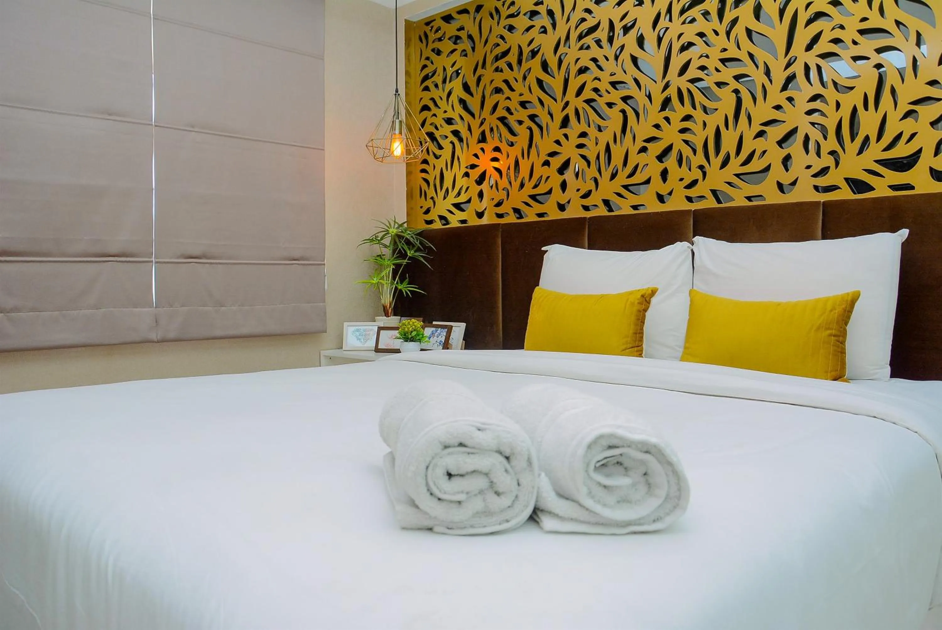 Bed in Comfy and Luxury 3BR Springlake Apartment By Travelio