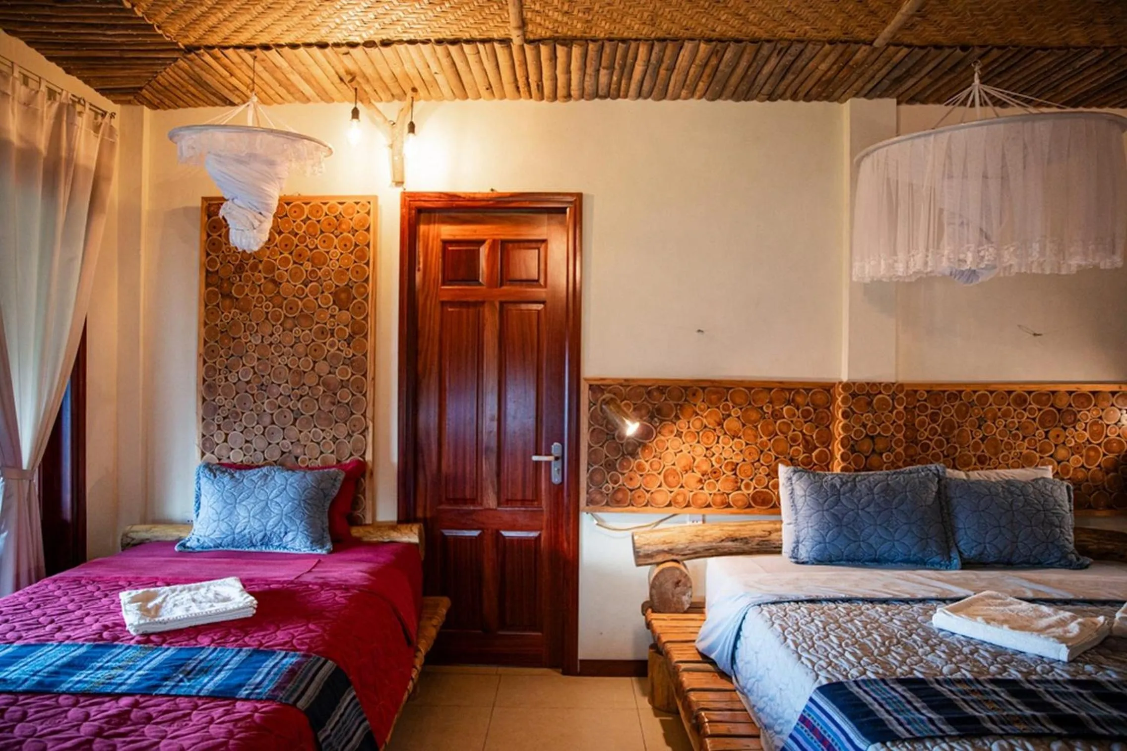 Bed in Pu Luong Jungle Lodge