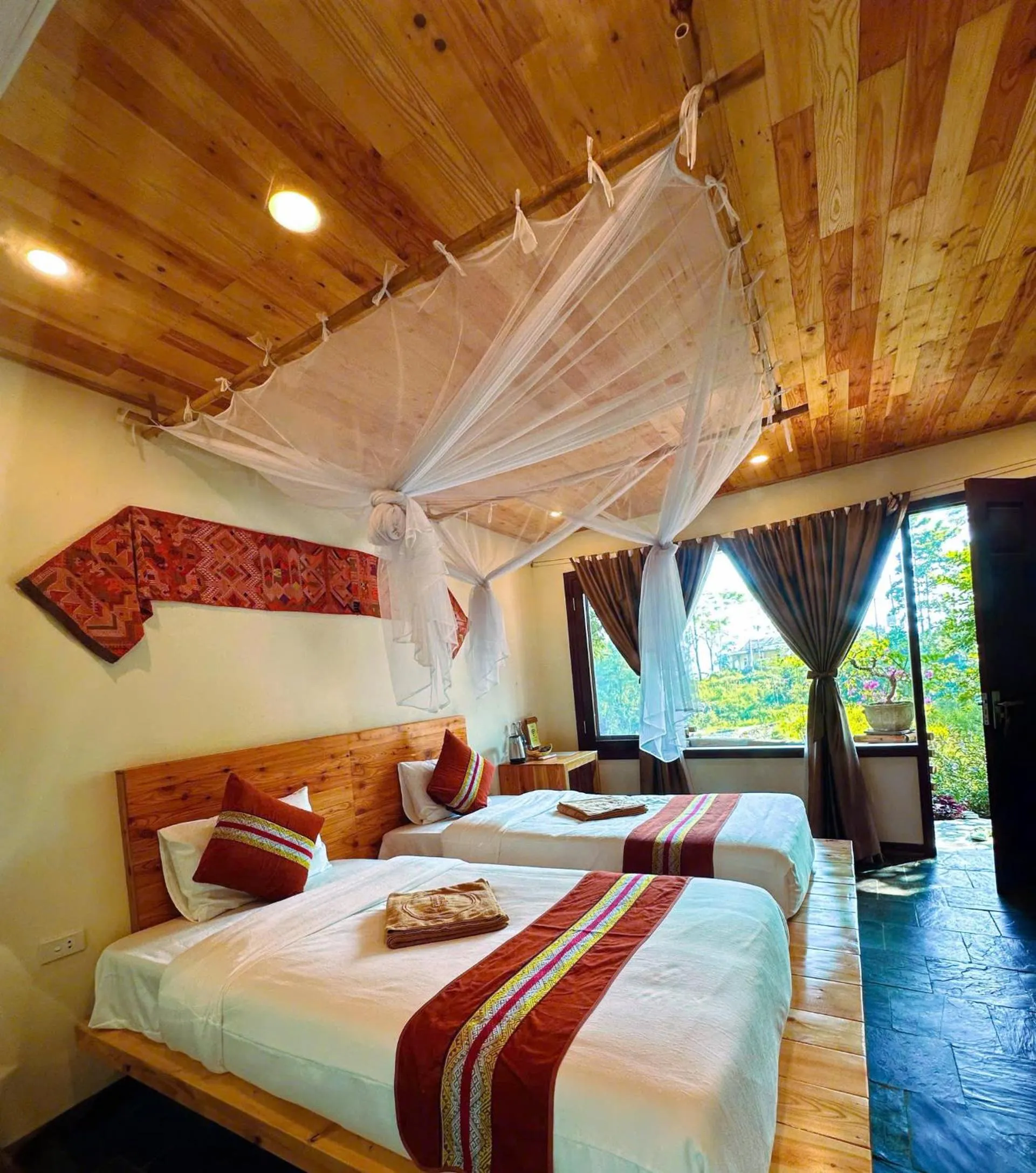 Bed in Pu Luong Jungle Lodge