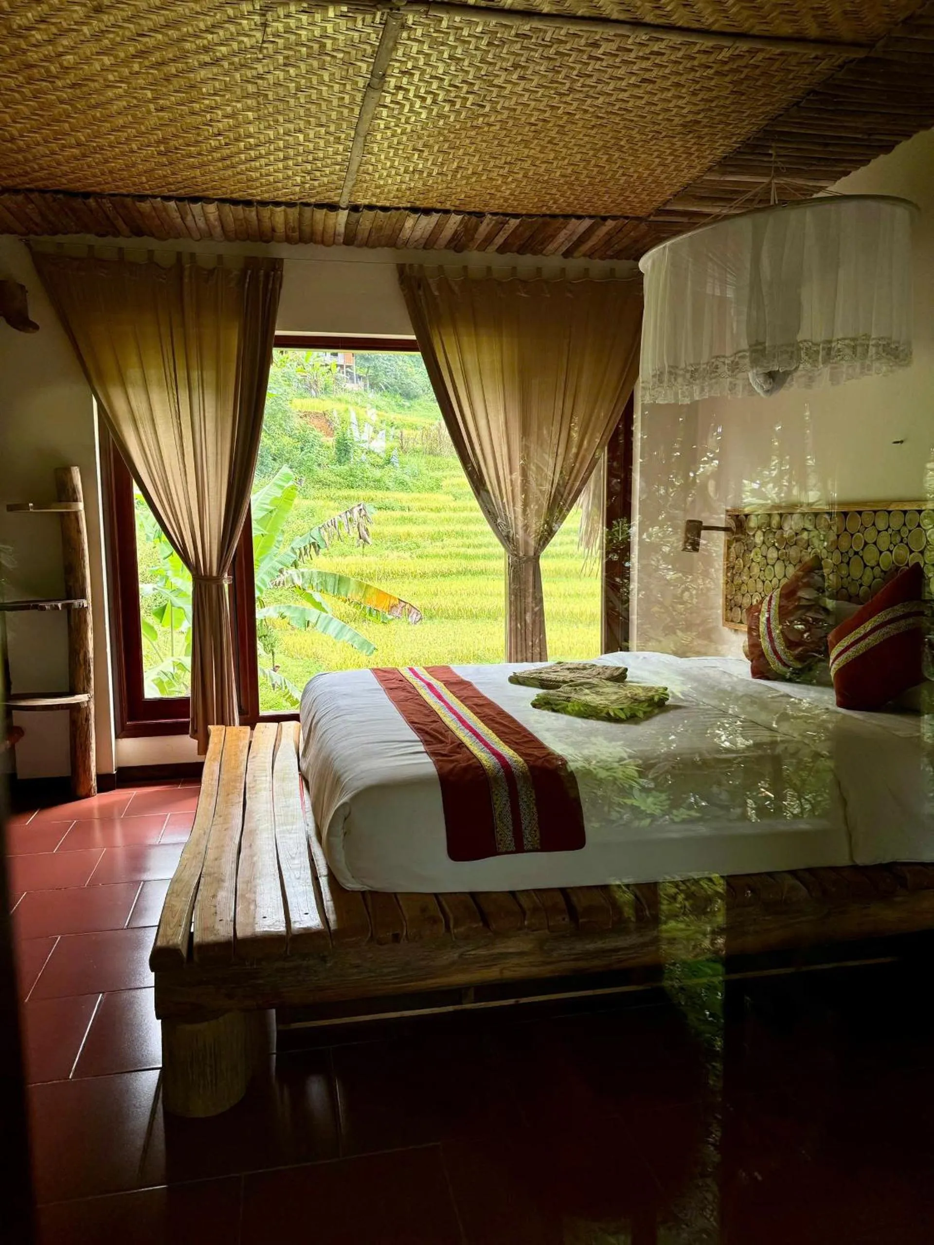 Bed in Pu Luong Jungle Lodge