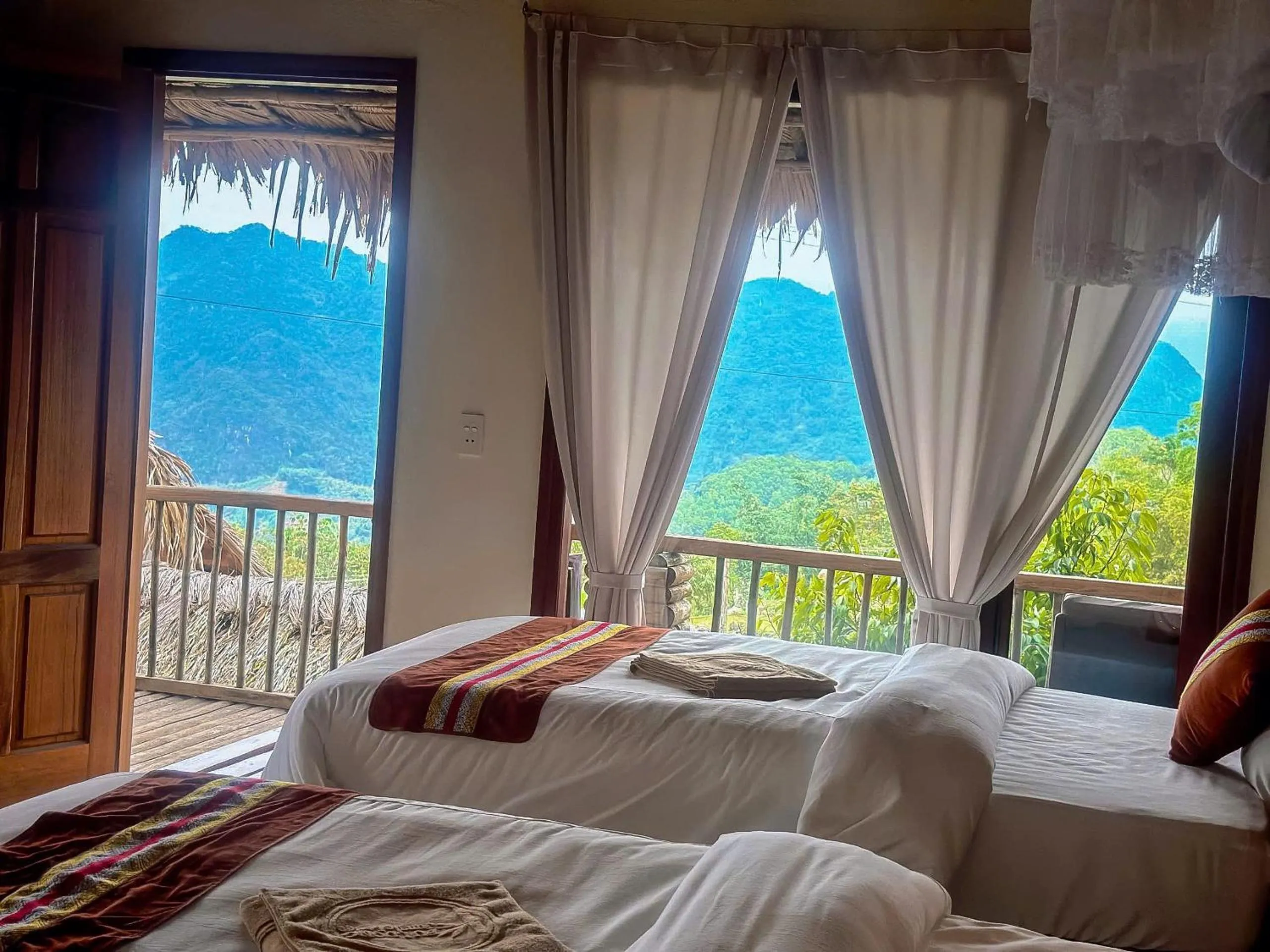 View (from property/room), Bed in Pu Luong Jungle Lodge