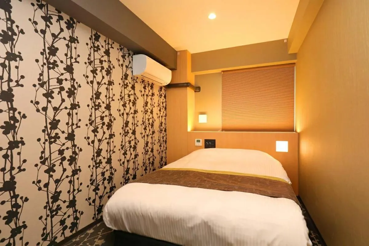 Bed in Hotel Matsunoi