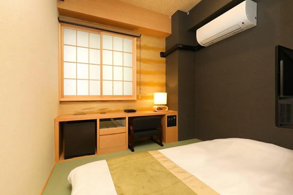 Bed in Hotel Matsunoi