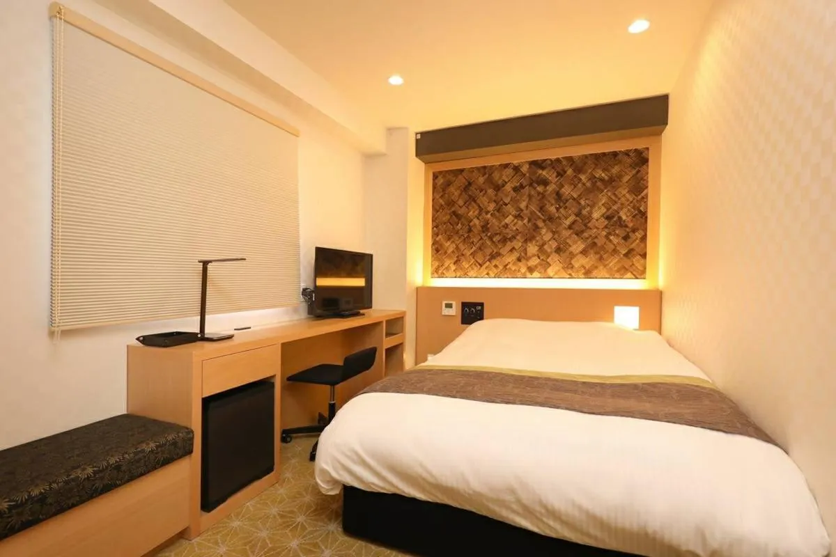 Bed in Hotel Matsunoi