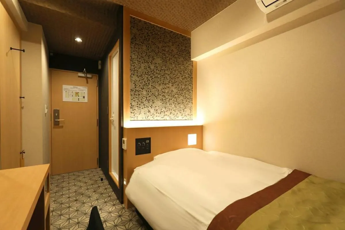 Bed in Hotel Matsunoi