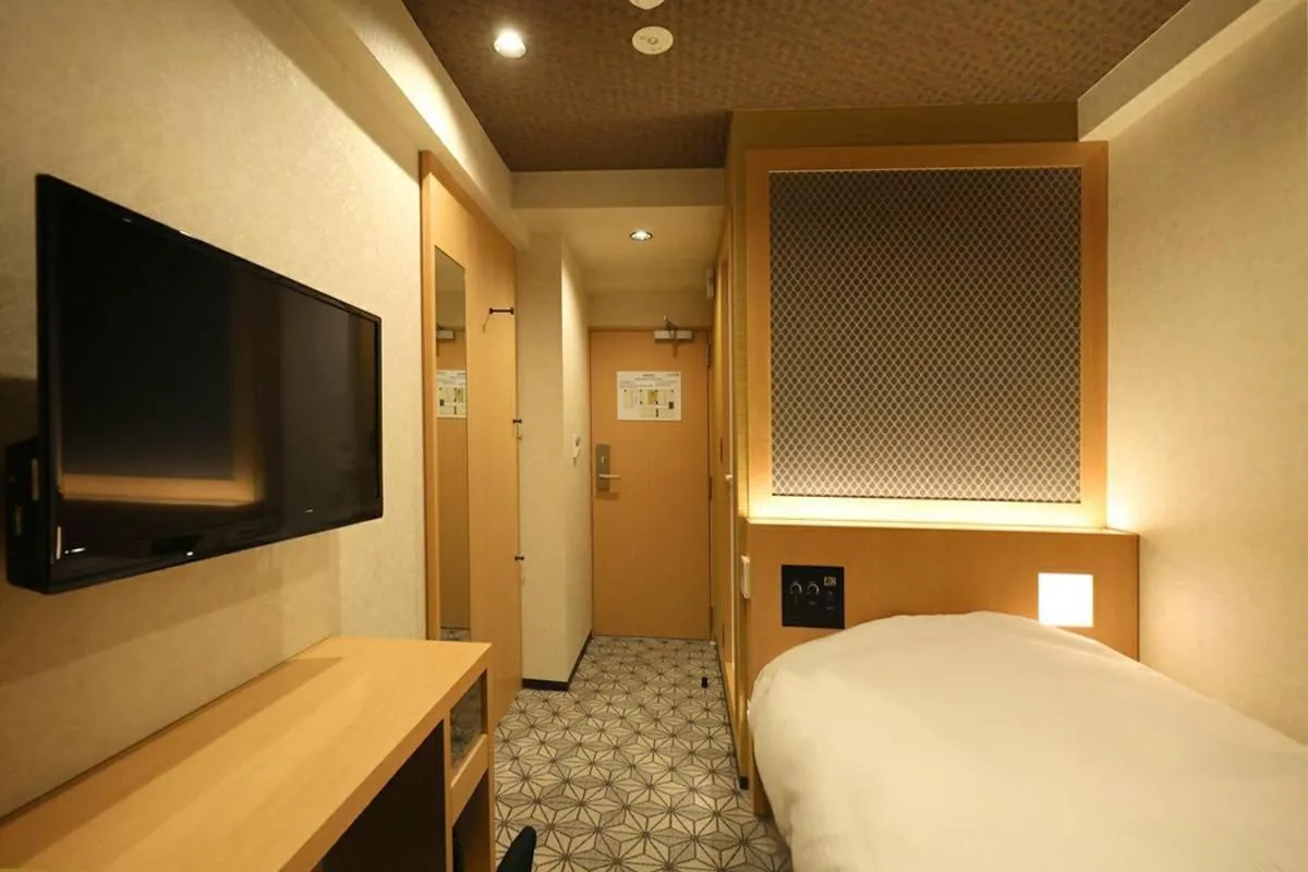 Bed in Hotel Matsunoi