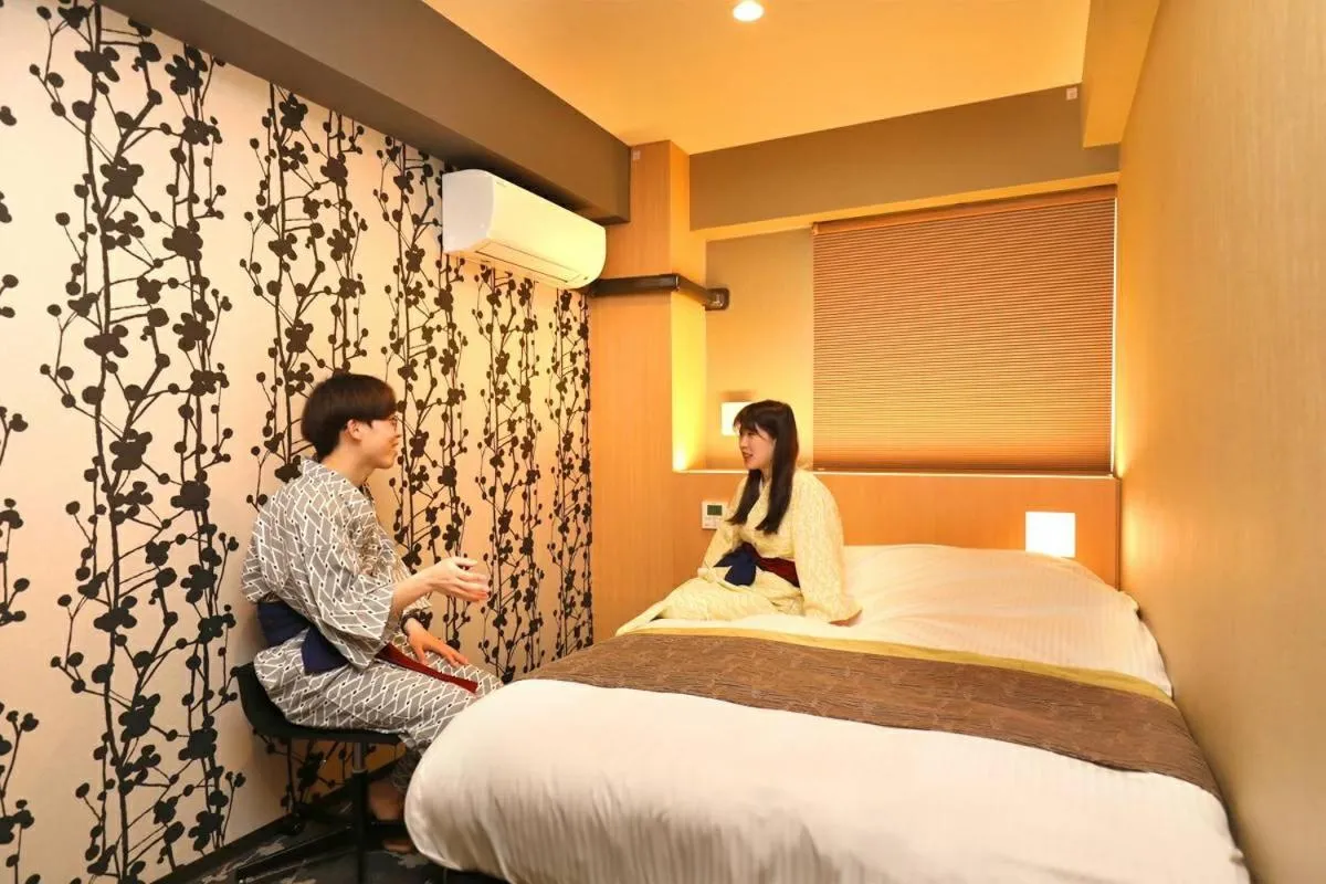 Bed in Hotel Matsunoi