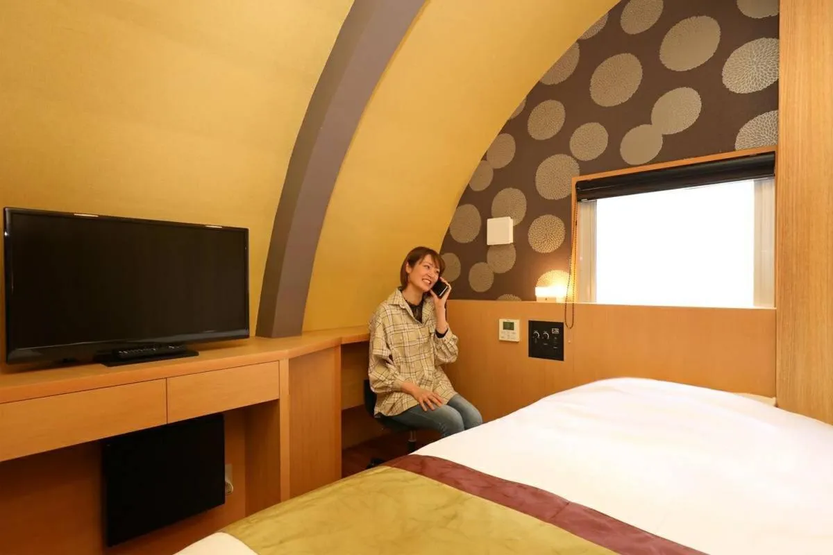 Bed in Hotel Matsunoi