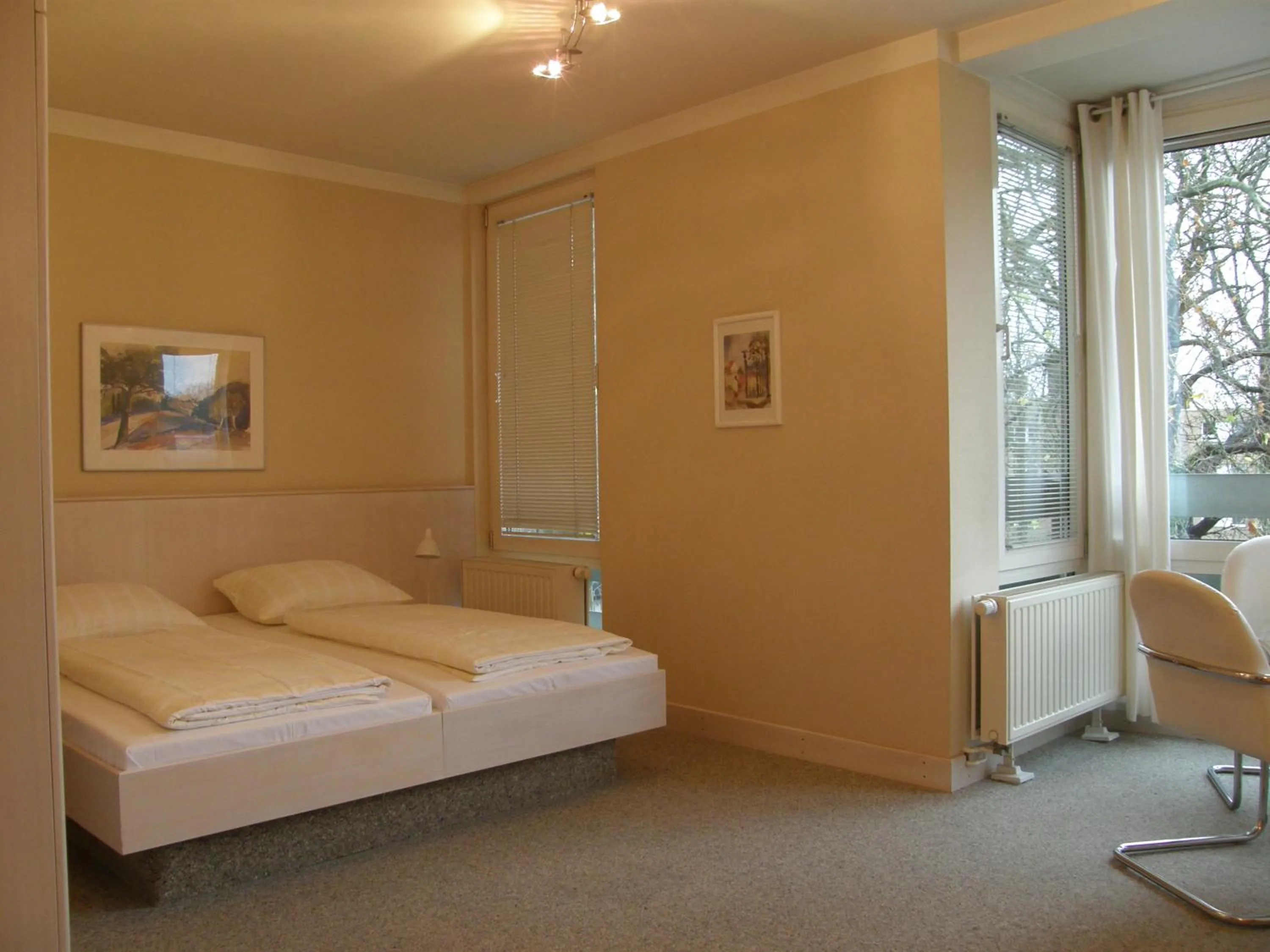 Photo of the whole room, Bed in Hotel St.-Michaels-Heim