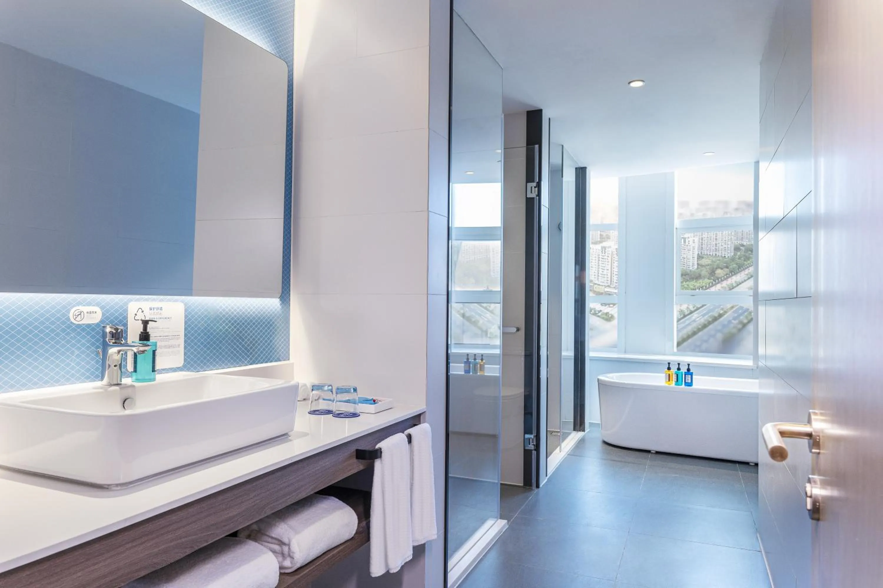 Bathroom in Holiday Inn Express Urumqi Station by IHG