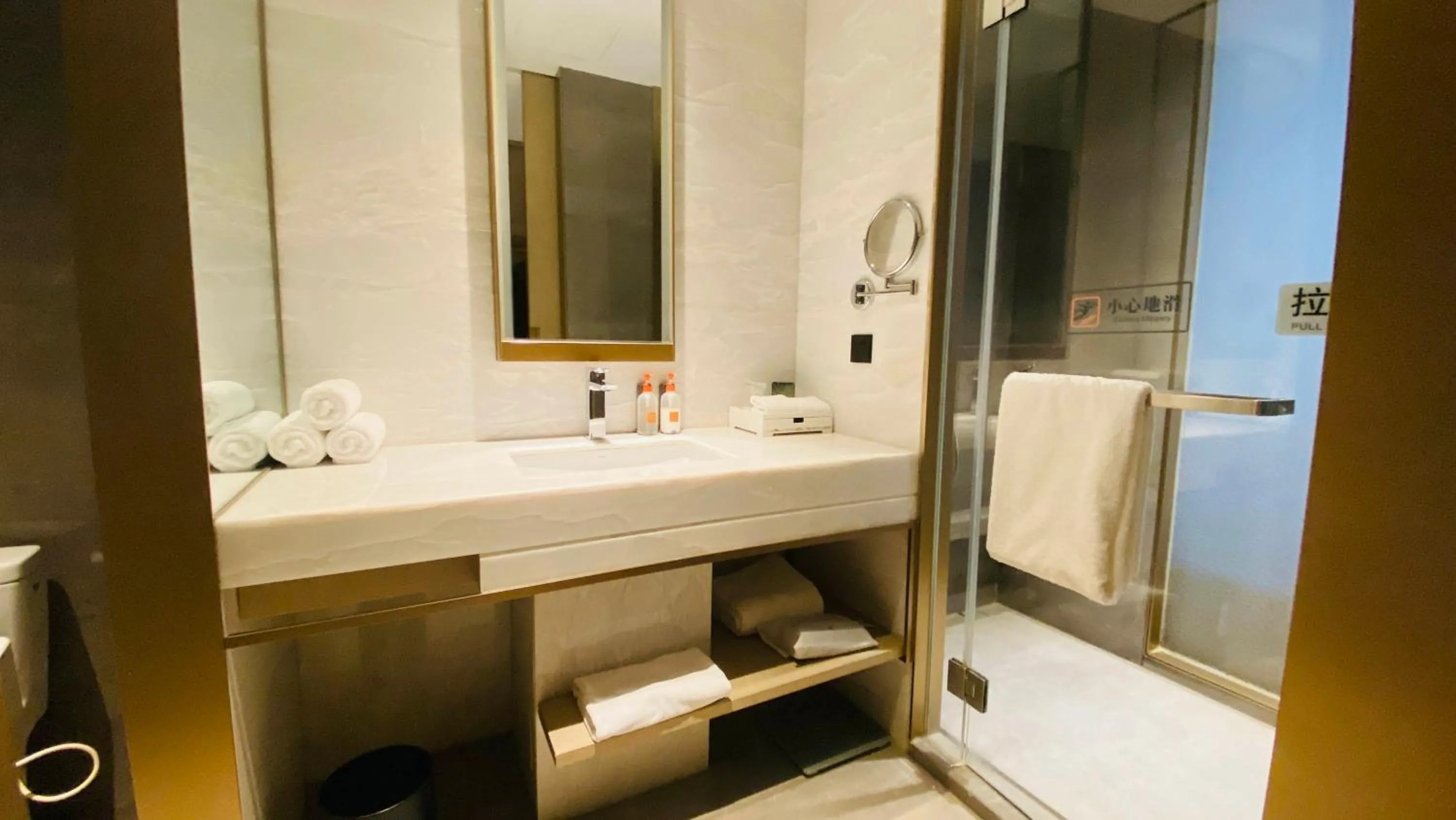 Shower in Crowne Plaza Fuzhou South by IHG