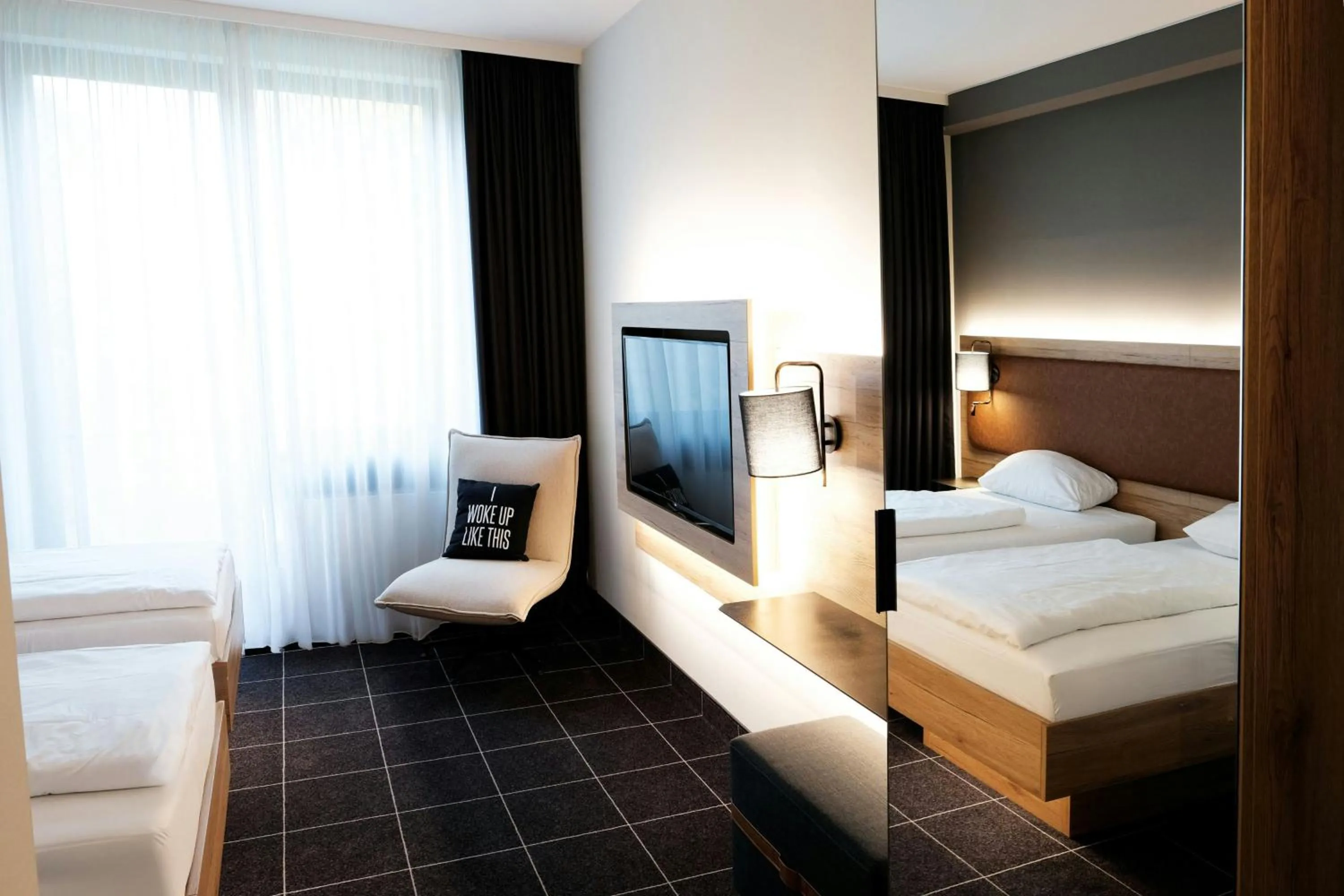 Photo of the whole room, Bed in Four Points Flex by Sheraton Ratingen Düsseldorf Airport