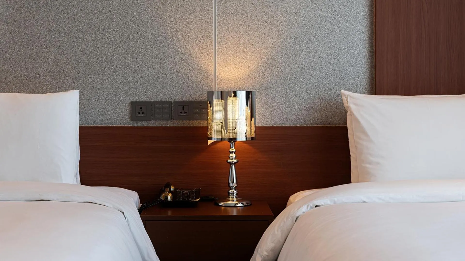 Bed in Hotel JCS Yeosu