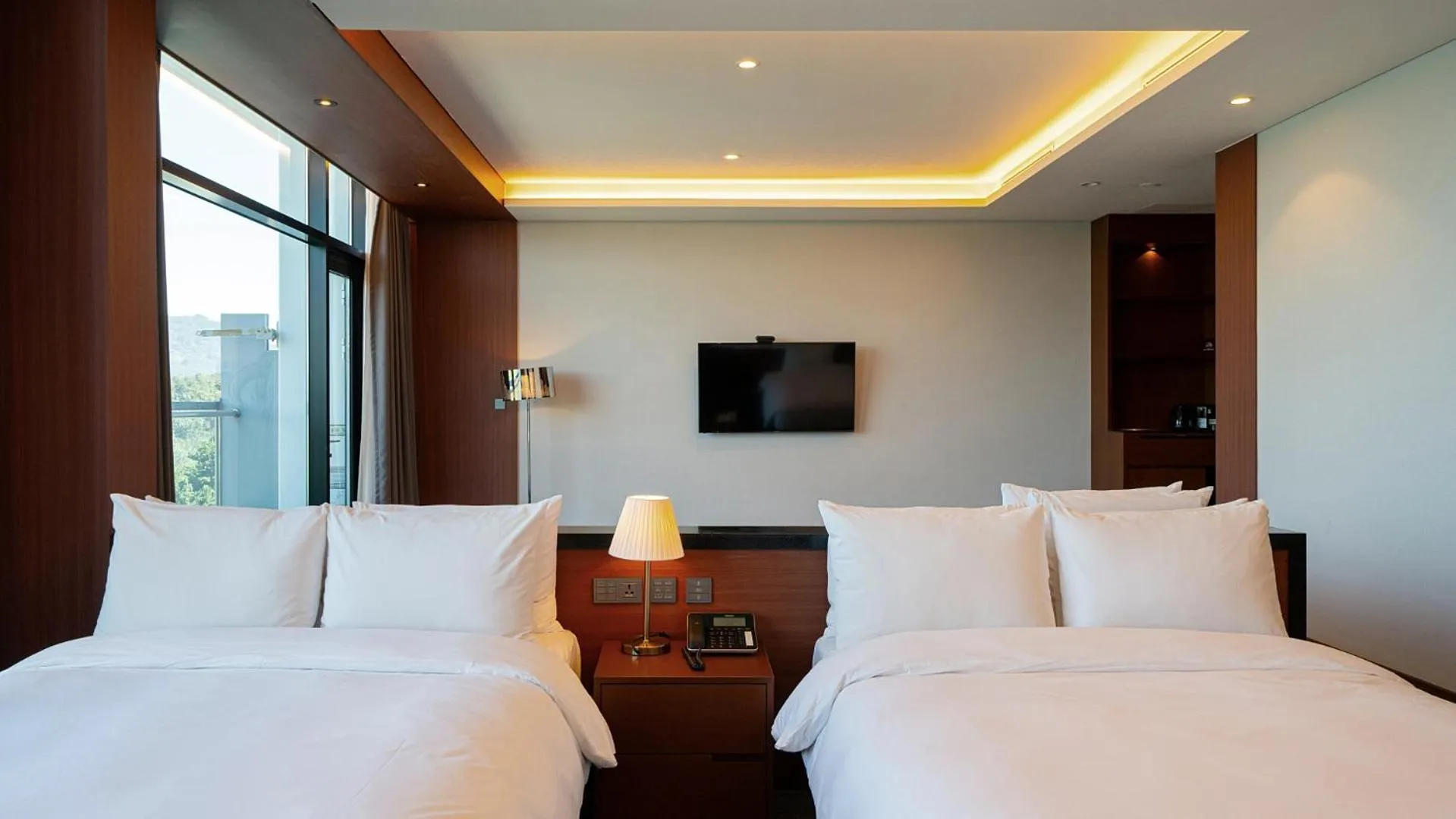 Bed in Hotel JCS Yeosu