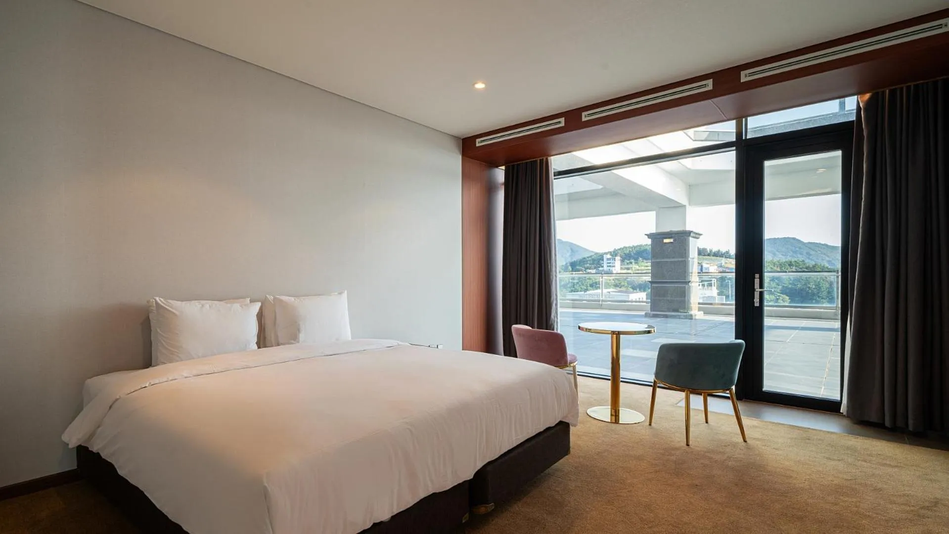 Bed in Hotel JCS Yeosu