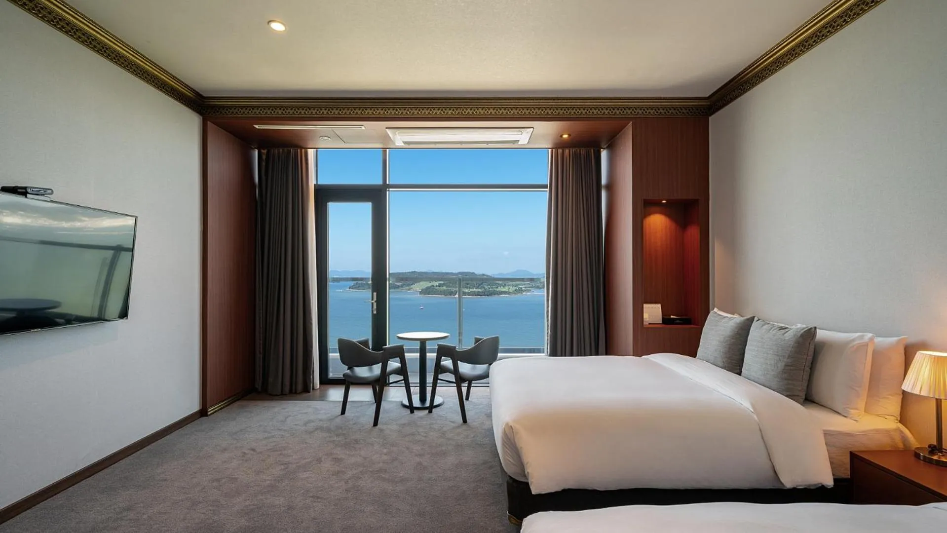 Bed in Hotel JCS Yeosu