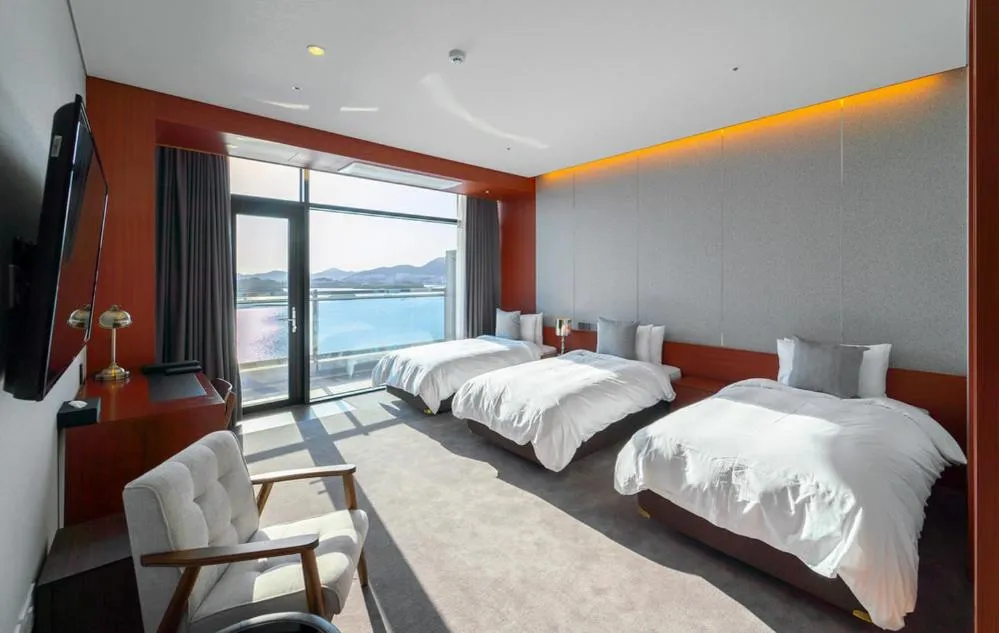 Bed in Hotel JCS Yeosu