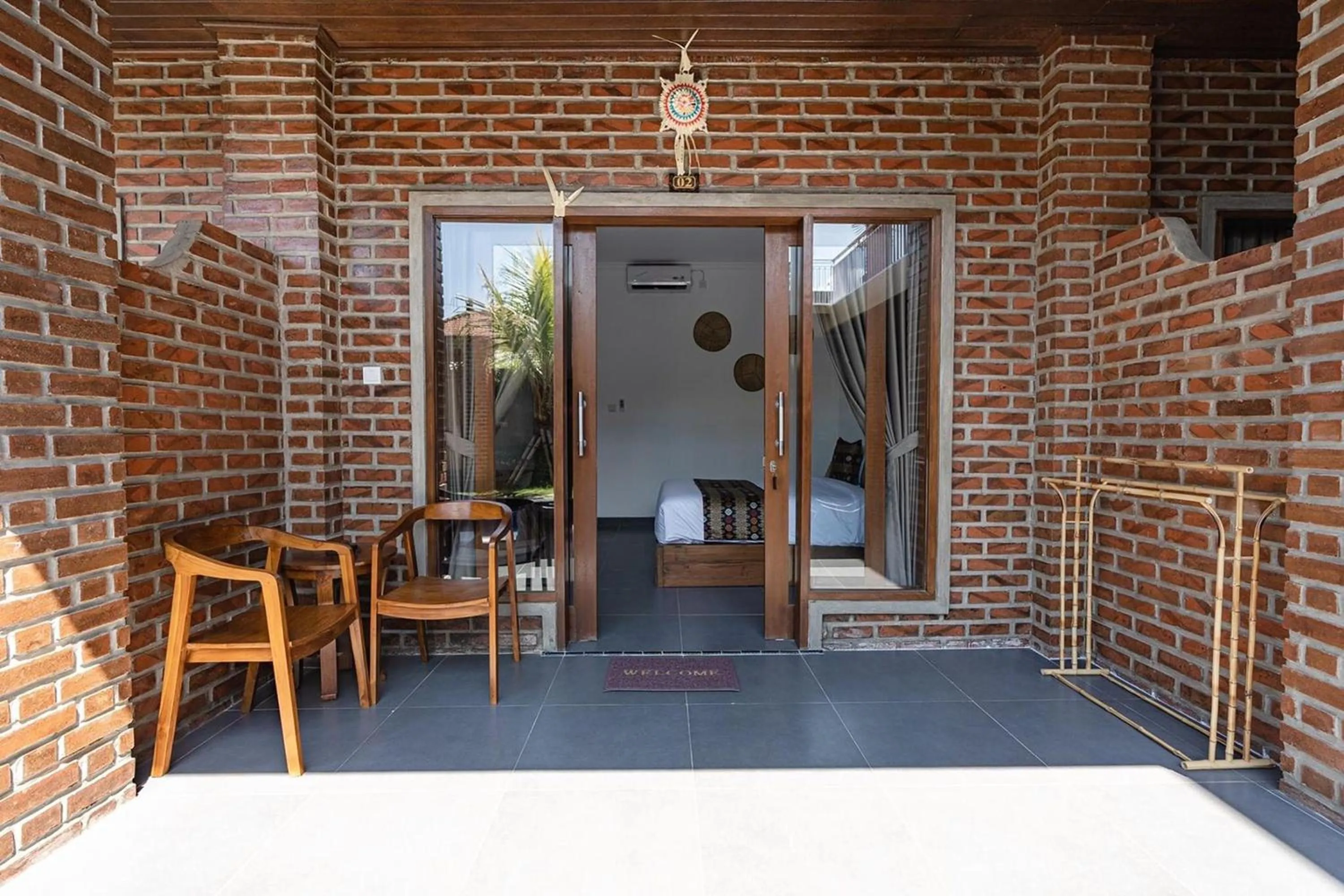 Bedroom in D'Meten Guest House Canggu