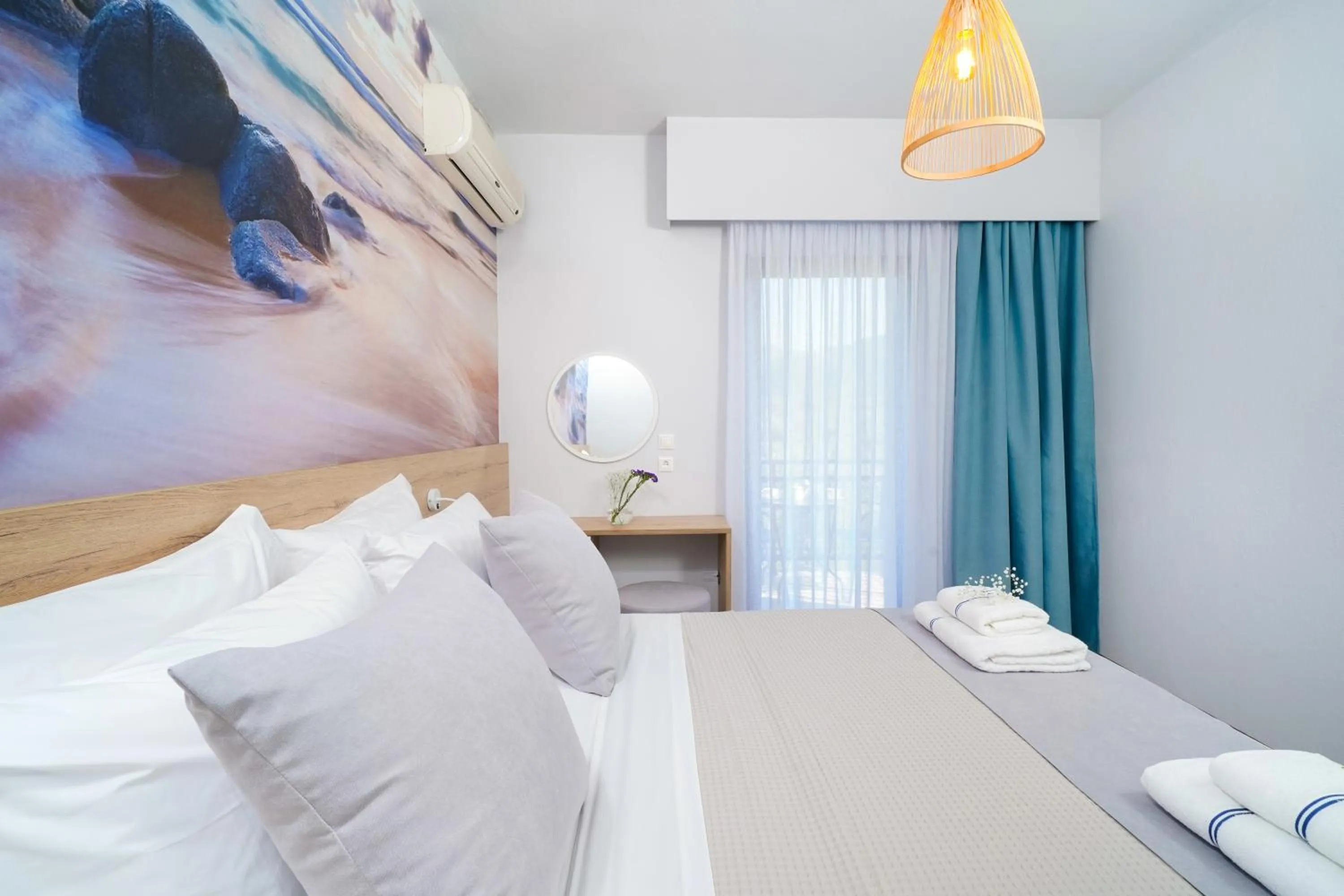 Bed in Nefeli Fresh Hotel by Del Mare