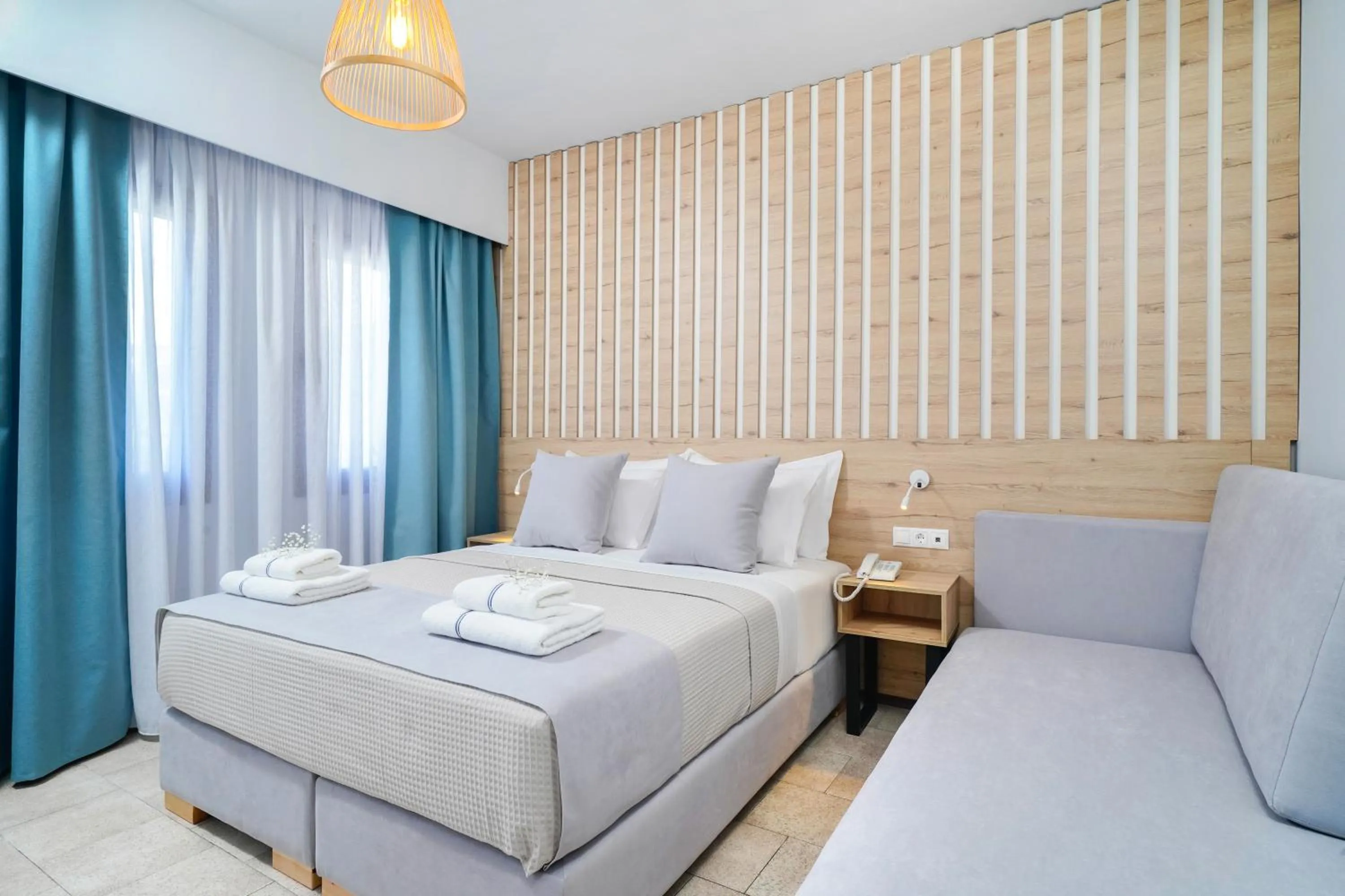 Bed in Nefeli Fresh Hotel by Del Mare