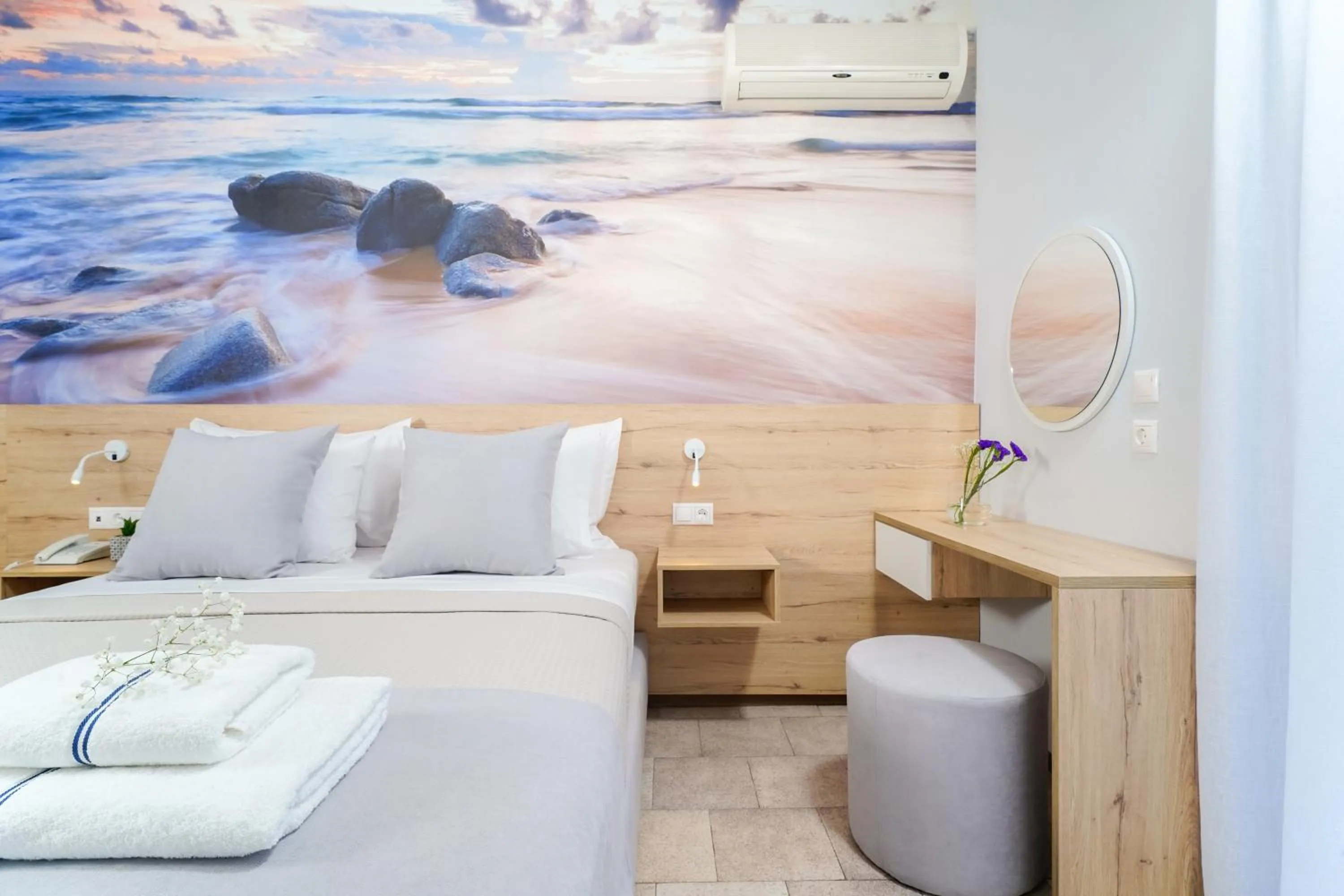 Bed in Nefeli Fresh Hotel by Del Mare