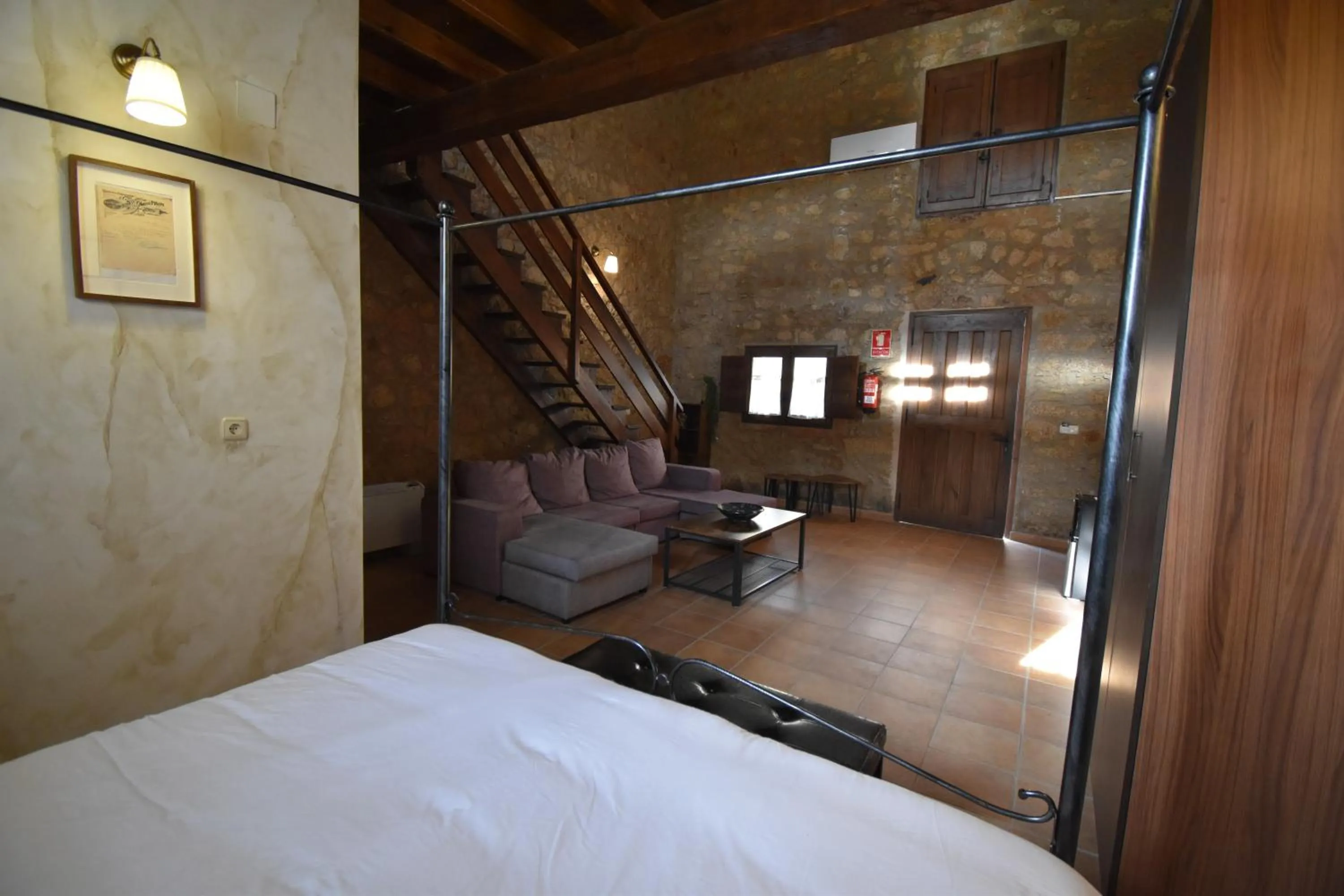 Living room, Bed in HOTEL RURAL A VELHA FABRICA