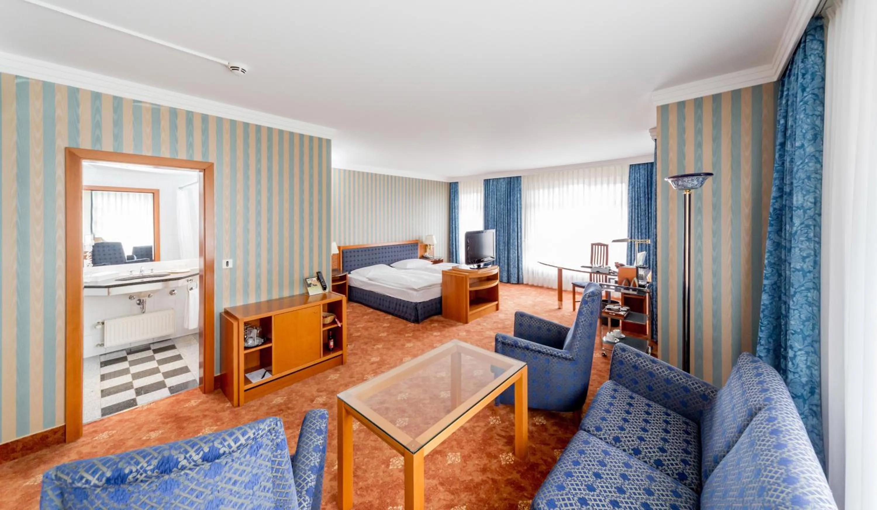 Photo of the whole room, Bed in Dorint Herrenkrug Parkhotel Magdeburg