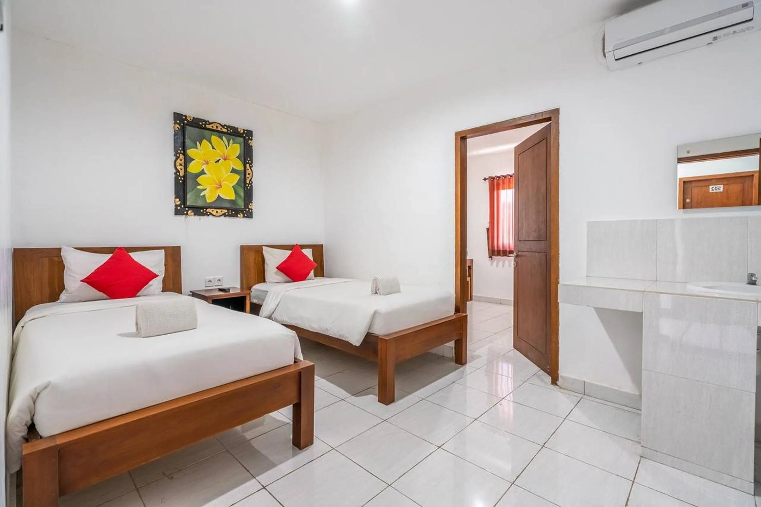 Photo of the whole room, Bed in Ganandra Stay Denpasar