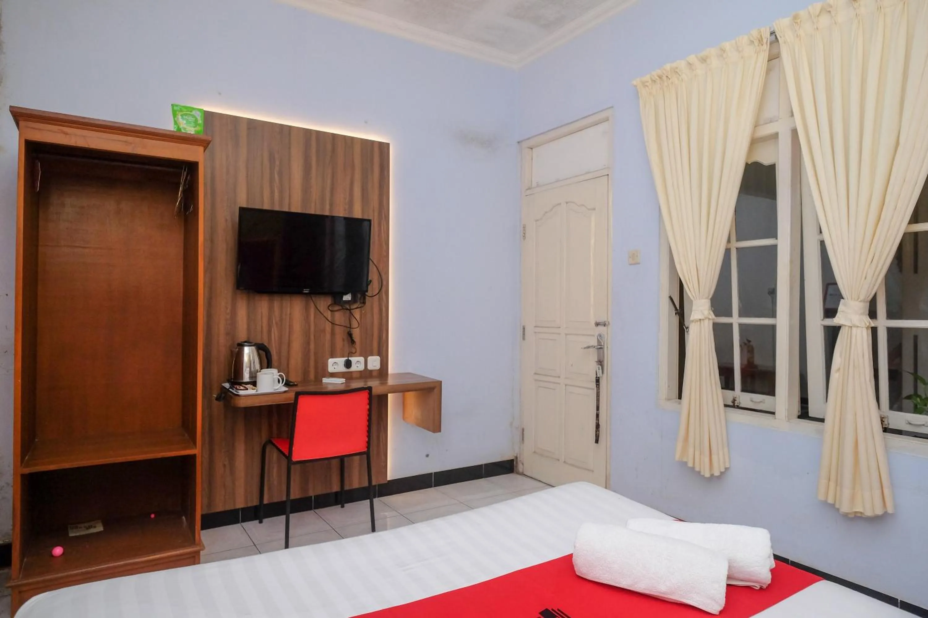 Bed in RedDoorz At Pondok Eyang Obi Sleman