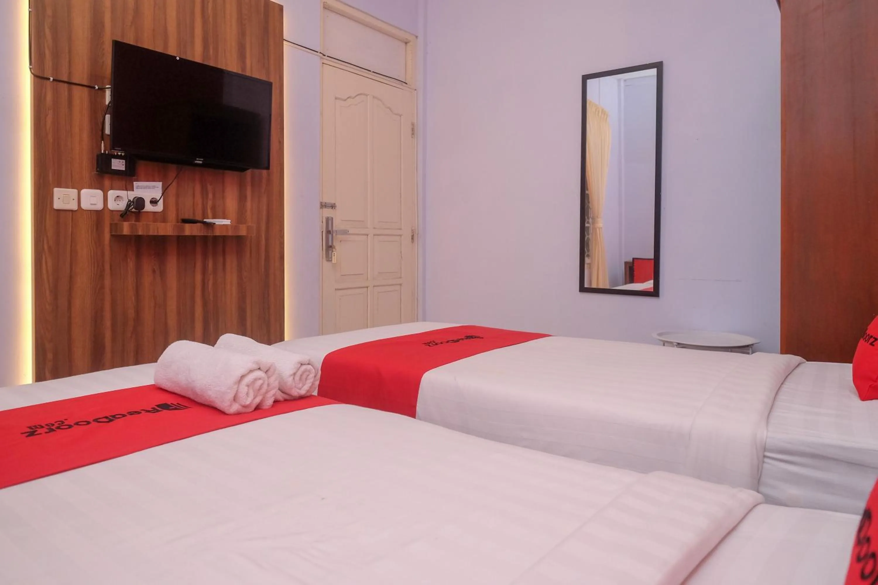 Bed in RedDoorz At Pondok Eyang Obi Sleman
