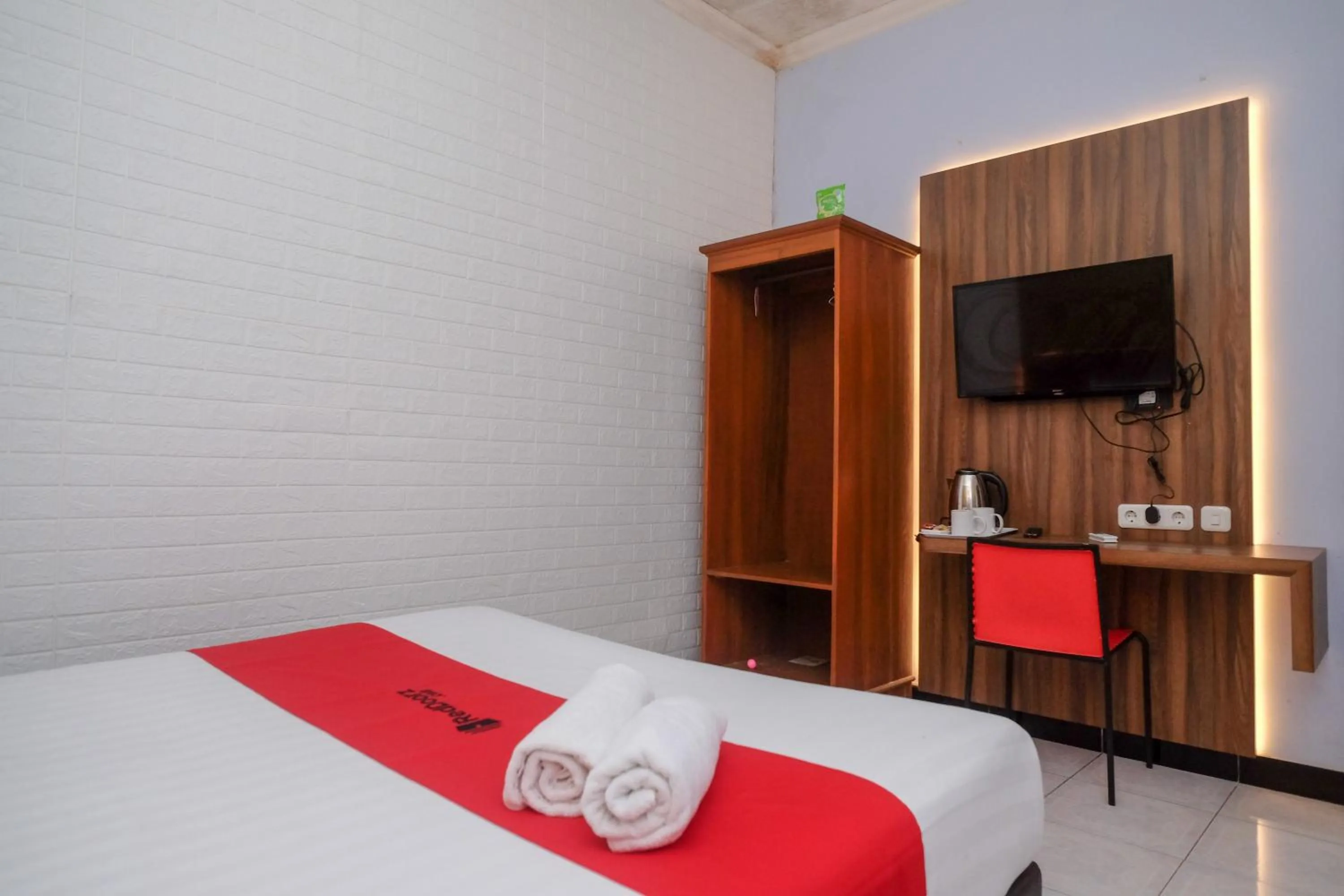 Bed in RedDoorz At Pondok Eyang Obi Sleman