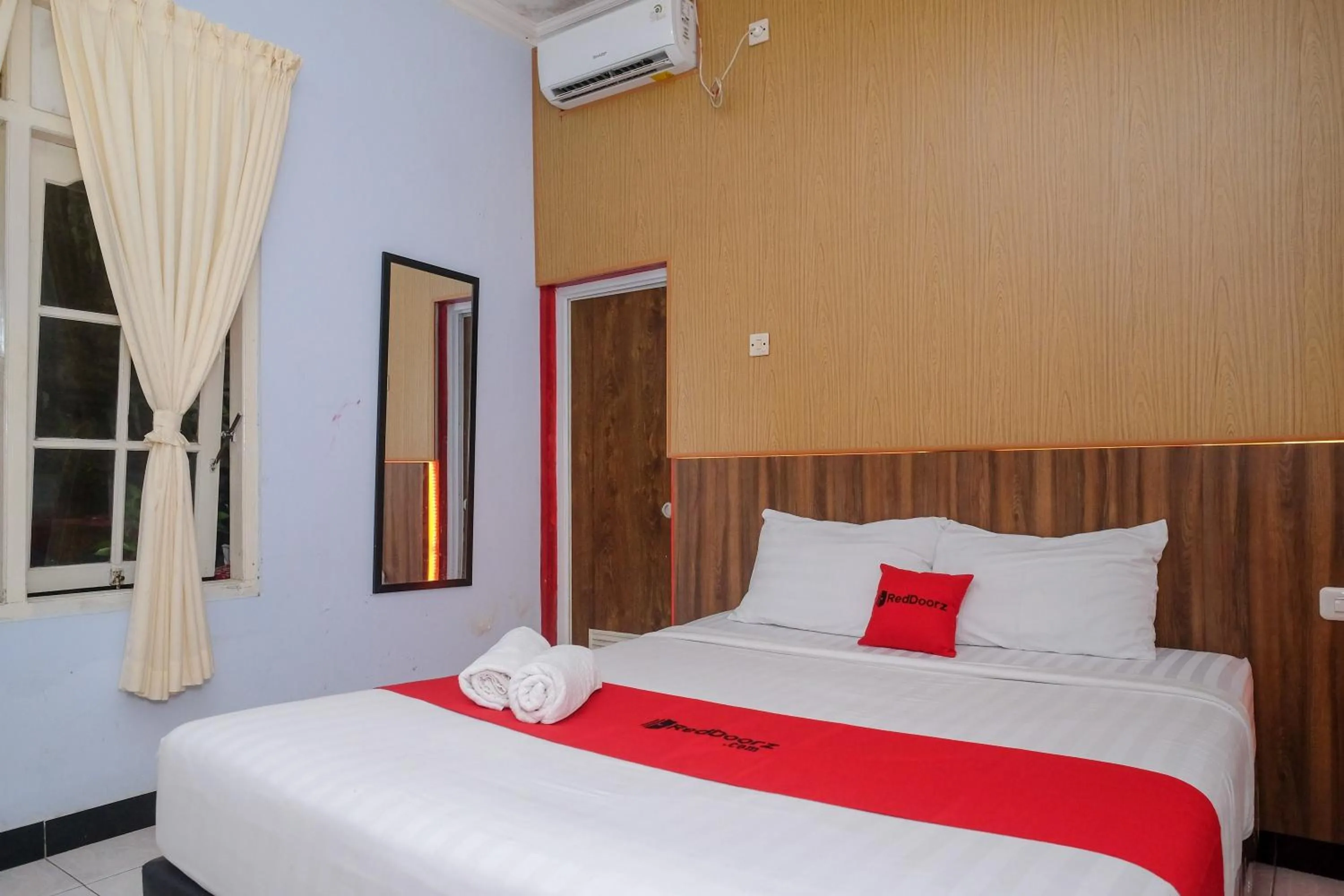 Bed in RedDoorz At Pondok Eyang Obi Sleman